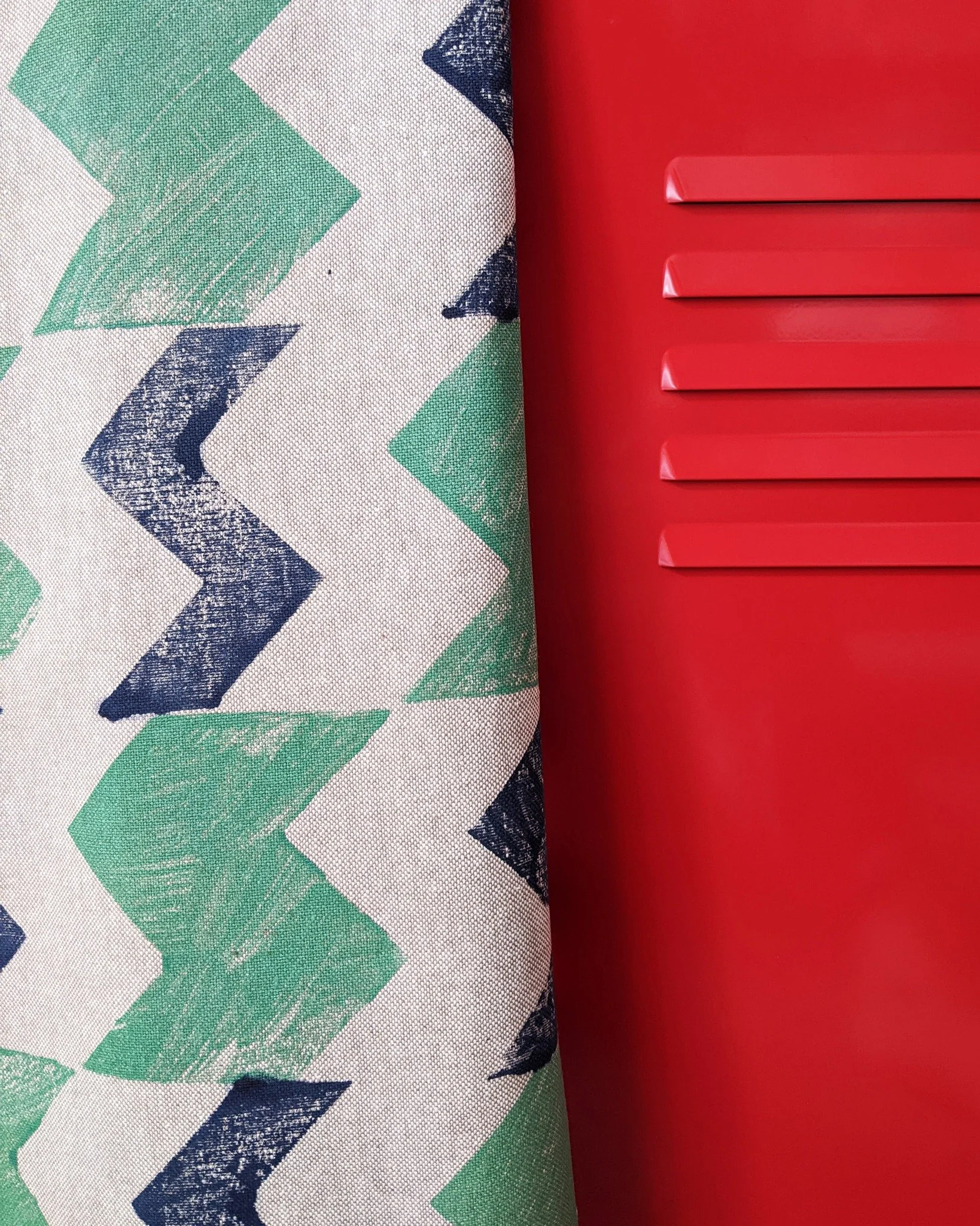 green and navy zigzag. ❤️💚 with red in the background.
consider this the official start of the festive season - no tinsel before this point was harmed.

this one takes its cues from electricity pylons and road signage rather than reindeer, but that 