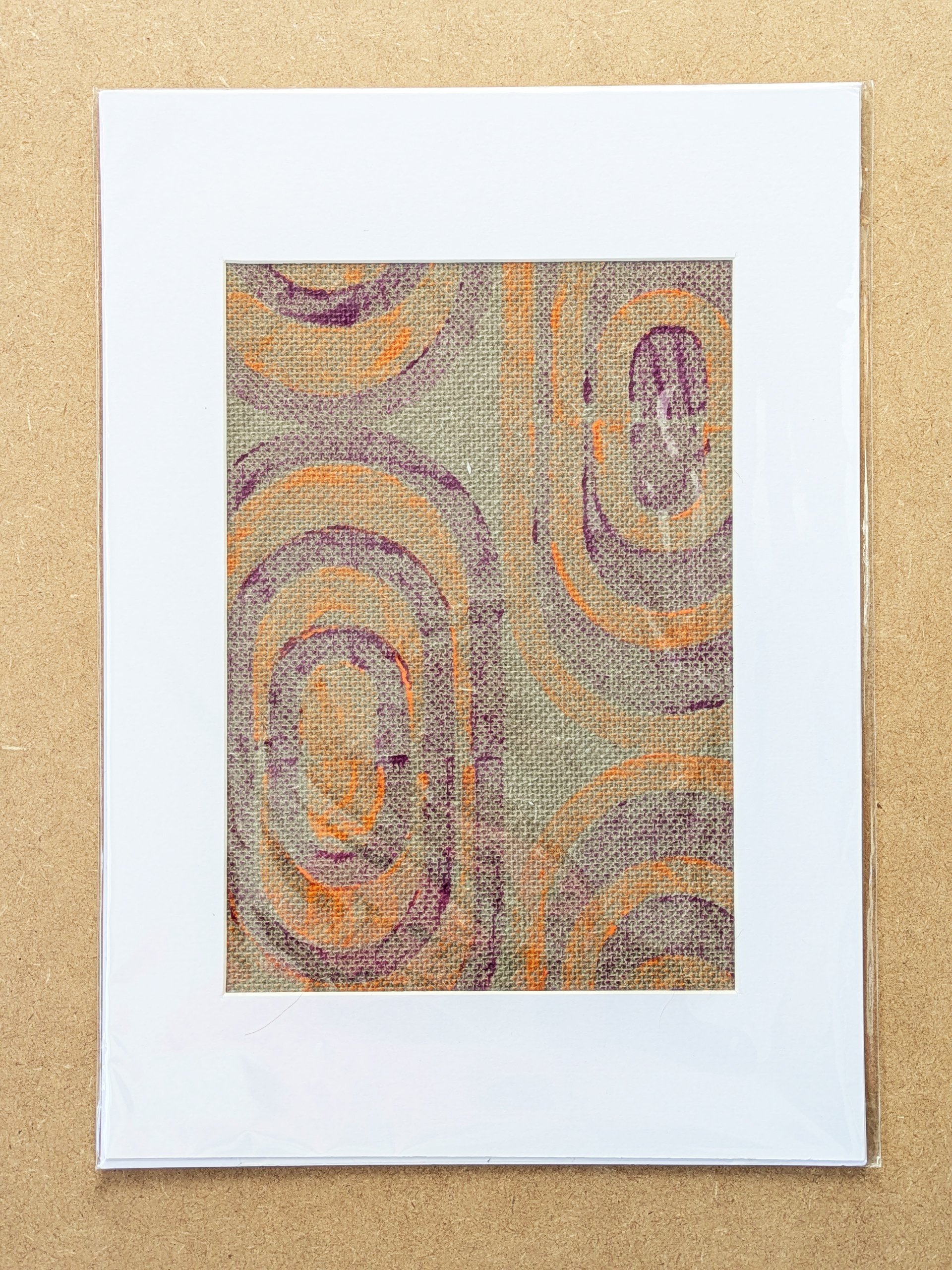 retro inspired modern block print on grasscloth wallpaper, framed in A3 mountboard