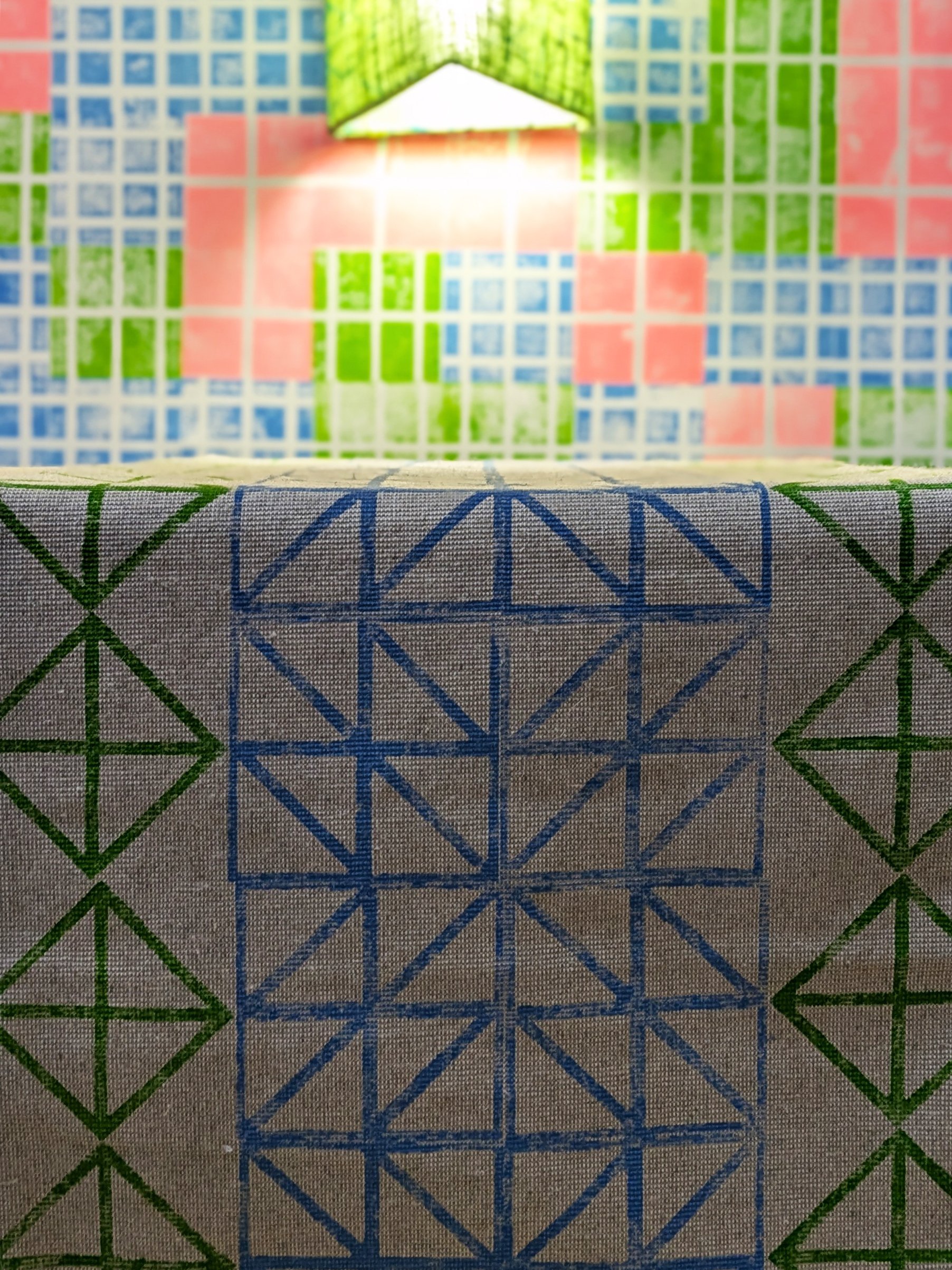 close-up detail of block printed table runner in bright contemporary geometric pattern