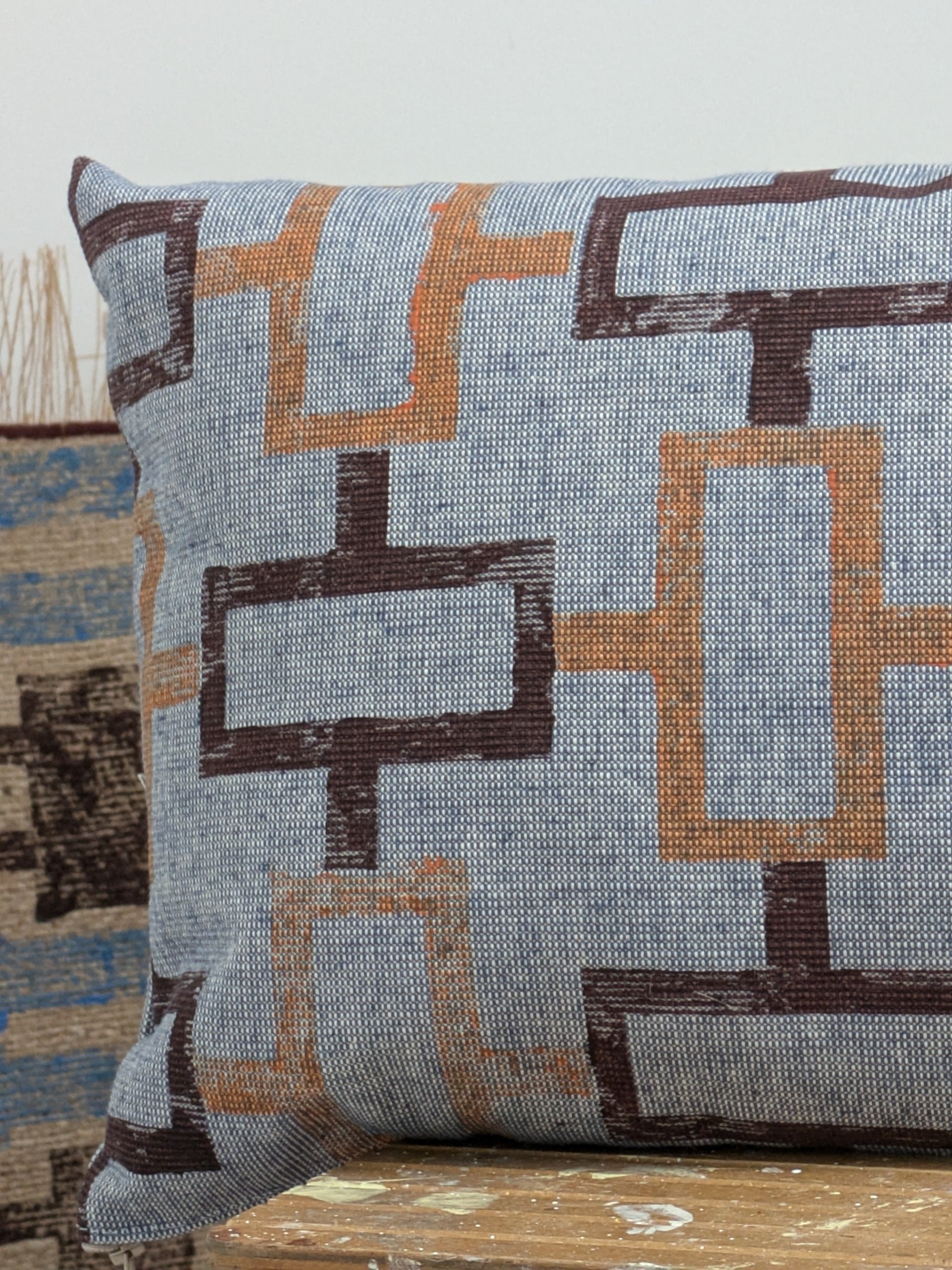 close-up detail of geometric block printed pattern on cushion