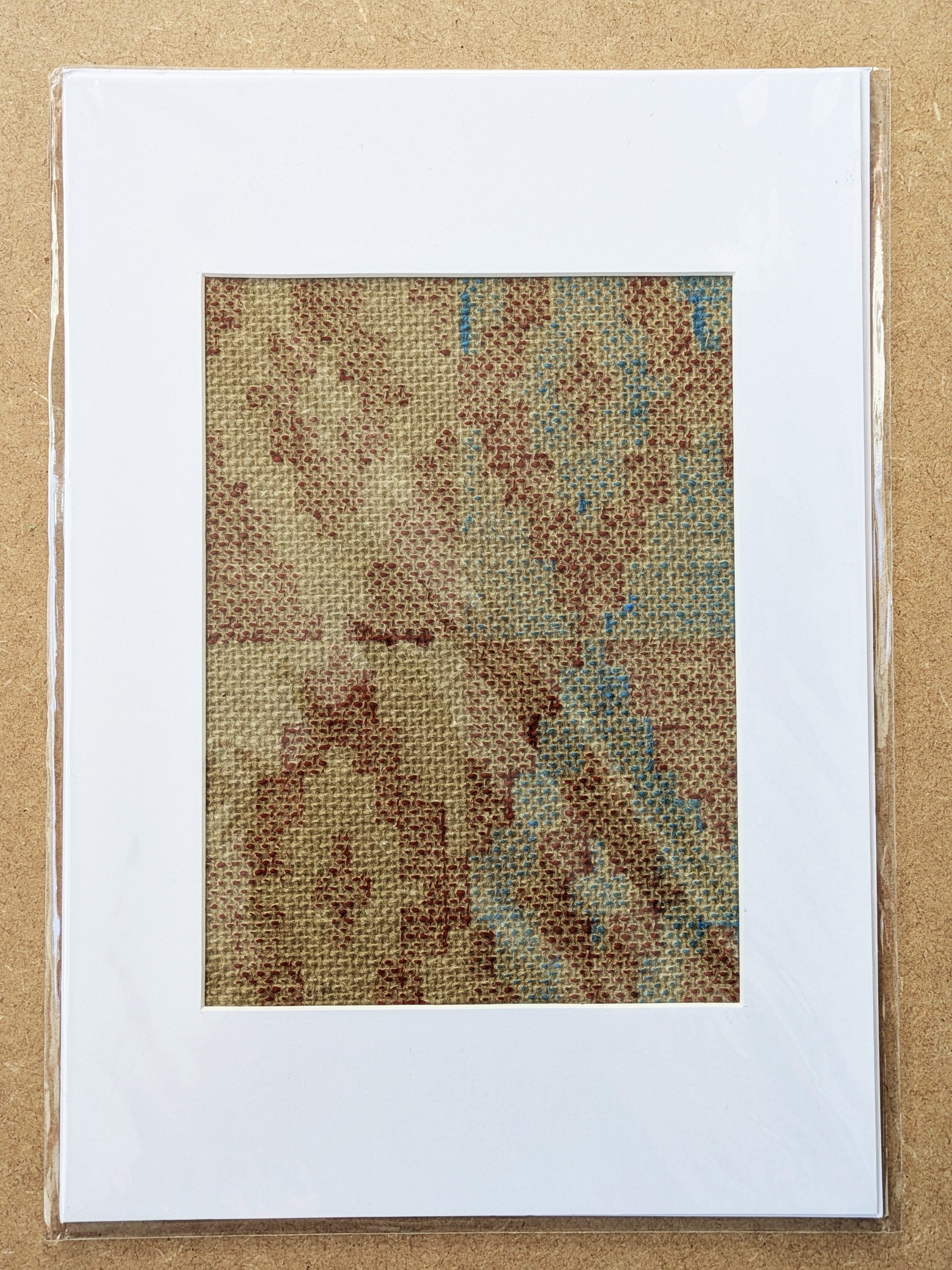 rustic A4 print on jute texture framed in white moubtboard