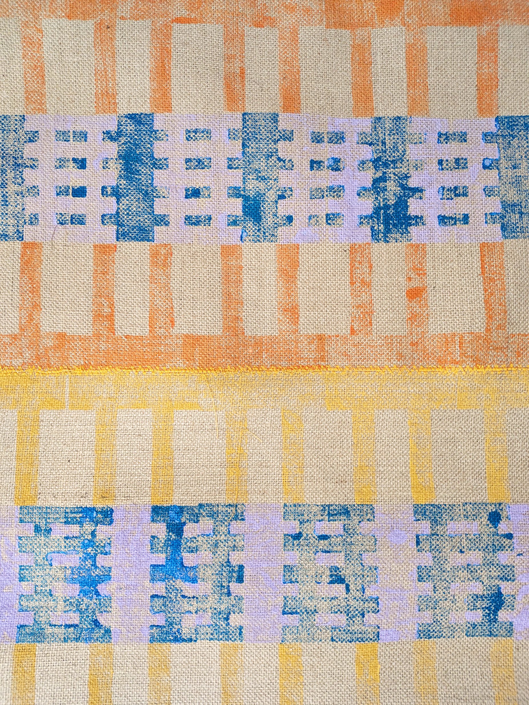 architectural horizontal row pattern in mustard, orange, blue and pastel lilac in contemporary textile design