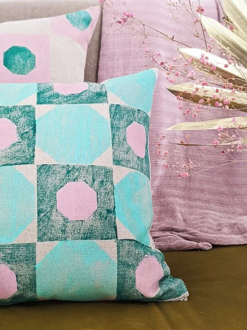 geometric printed pattern in pastel and lush green in glamorous interior