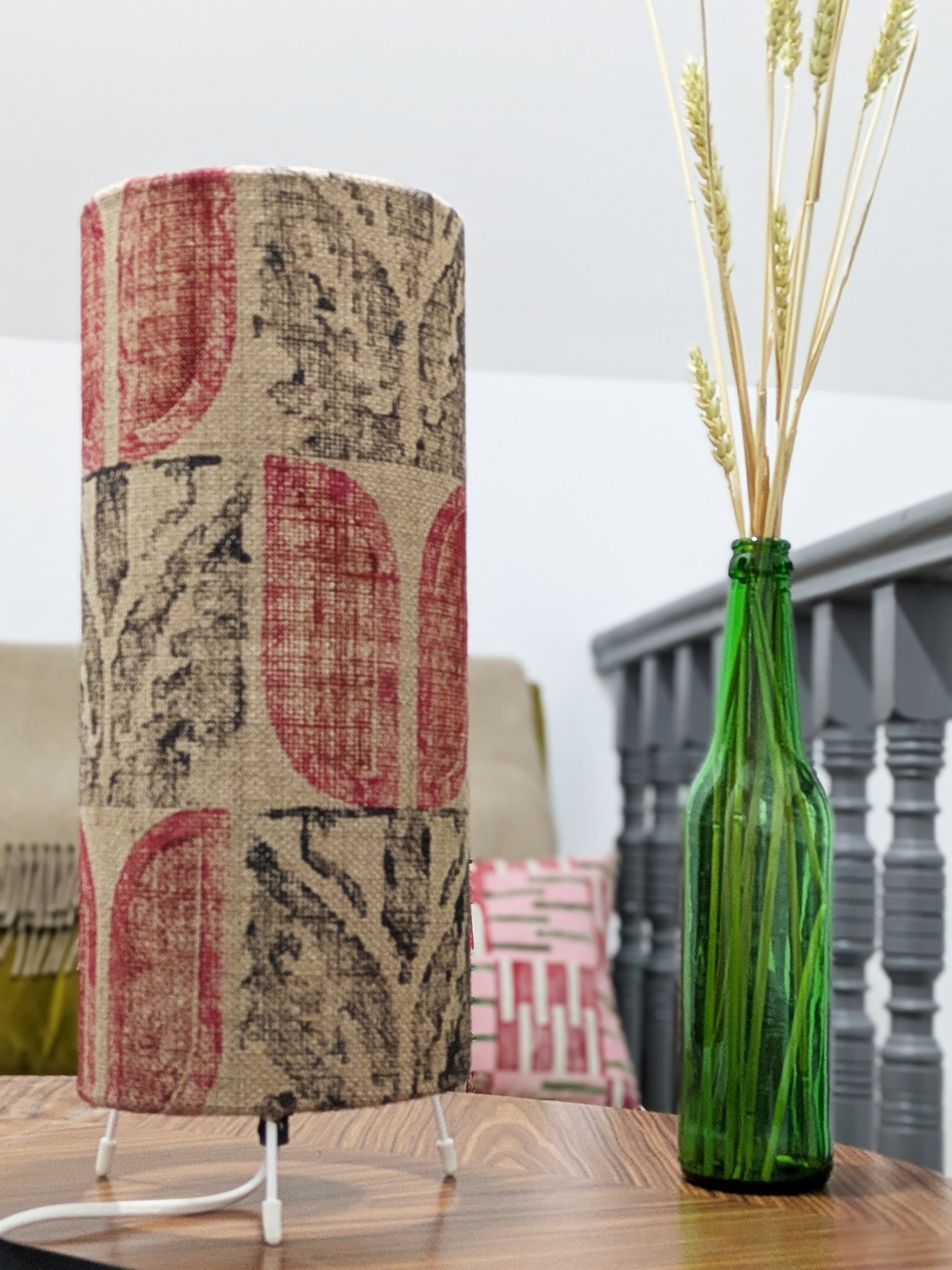 cosy interior scene with folk-inspired print on rustic jute lampshade