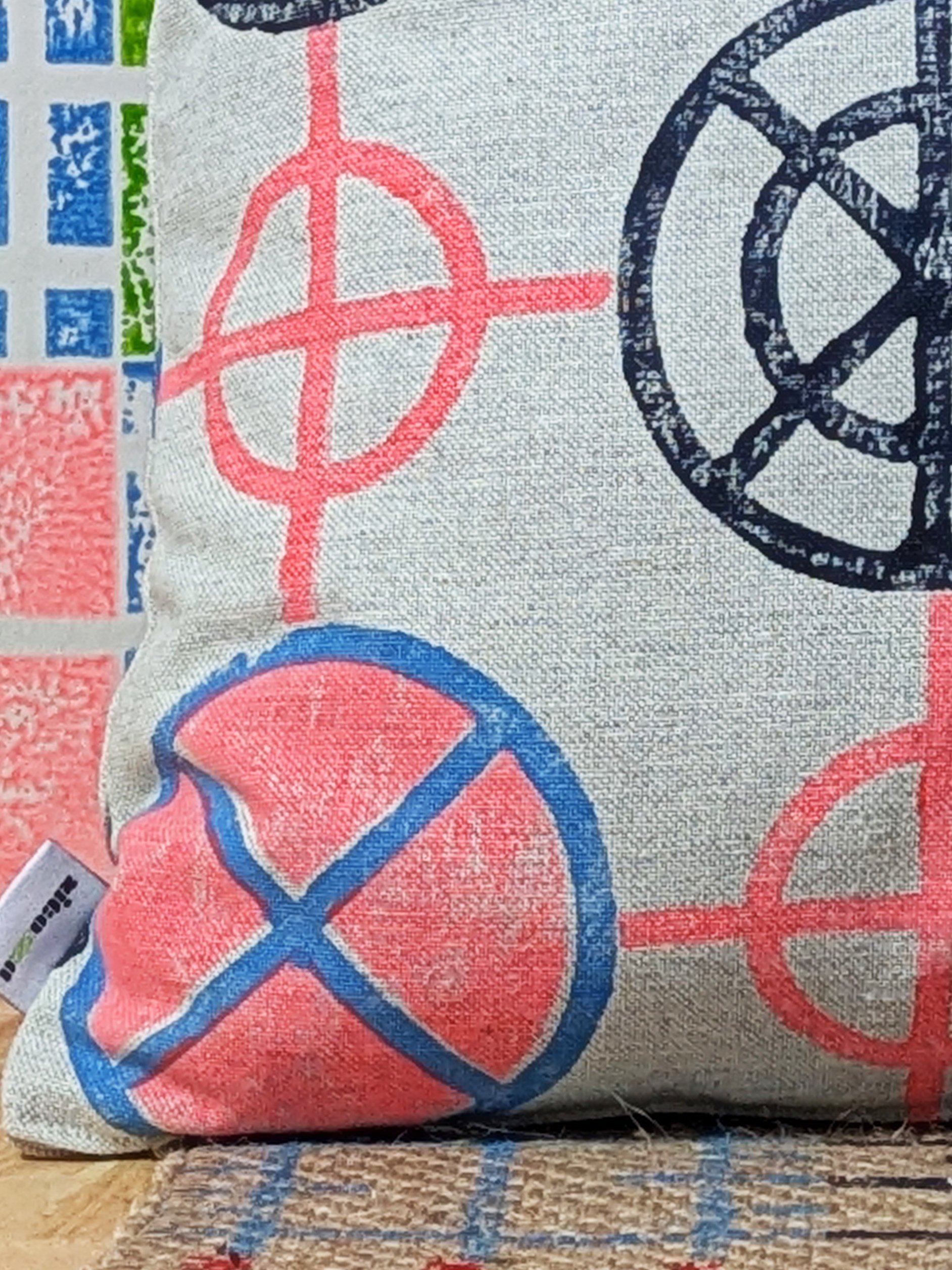 close-up detail of neon printed cushion in graphic geometric industrial print