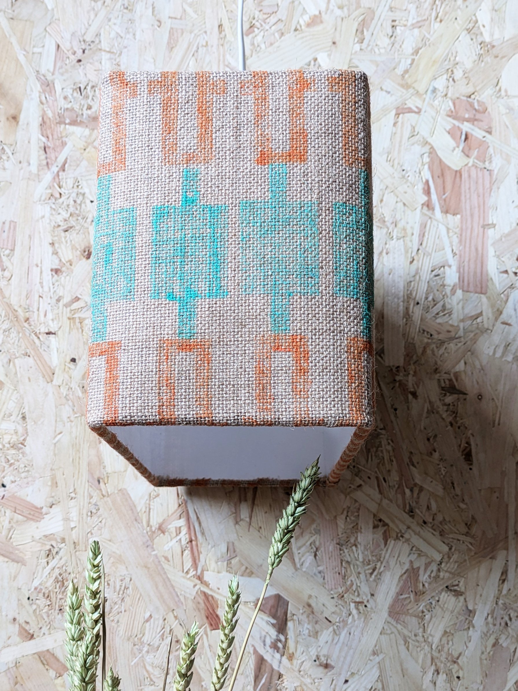printed jute lampshade with rectangular frame and geometric contemporary pattern in mint green and orange