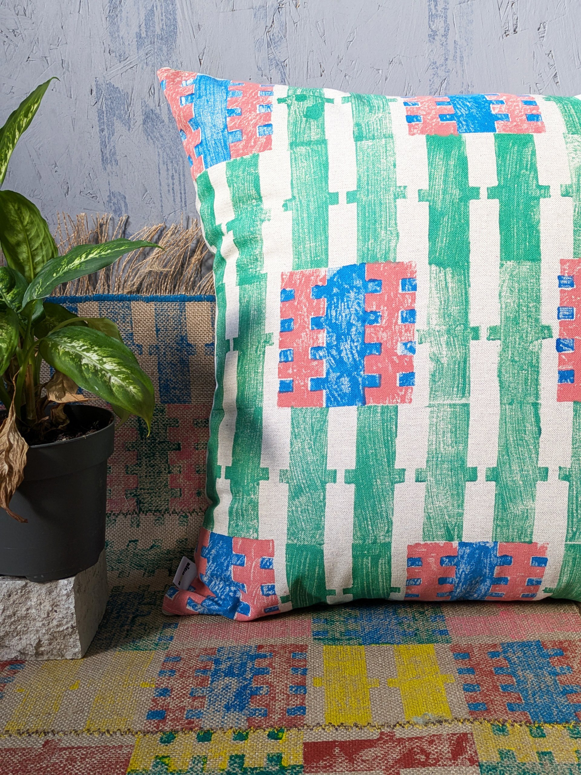 bold stripes on hand block printed cushion in lush summer colours in green and blue