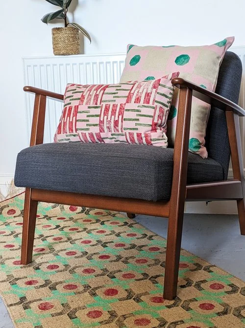 interior decor scheme with pastel pink, green and cherry red brick patterns
