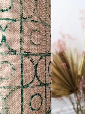 close-up detail of decorative geometric vintage print on hessian lamp