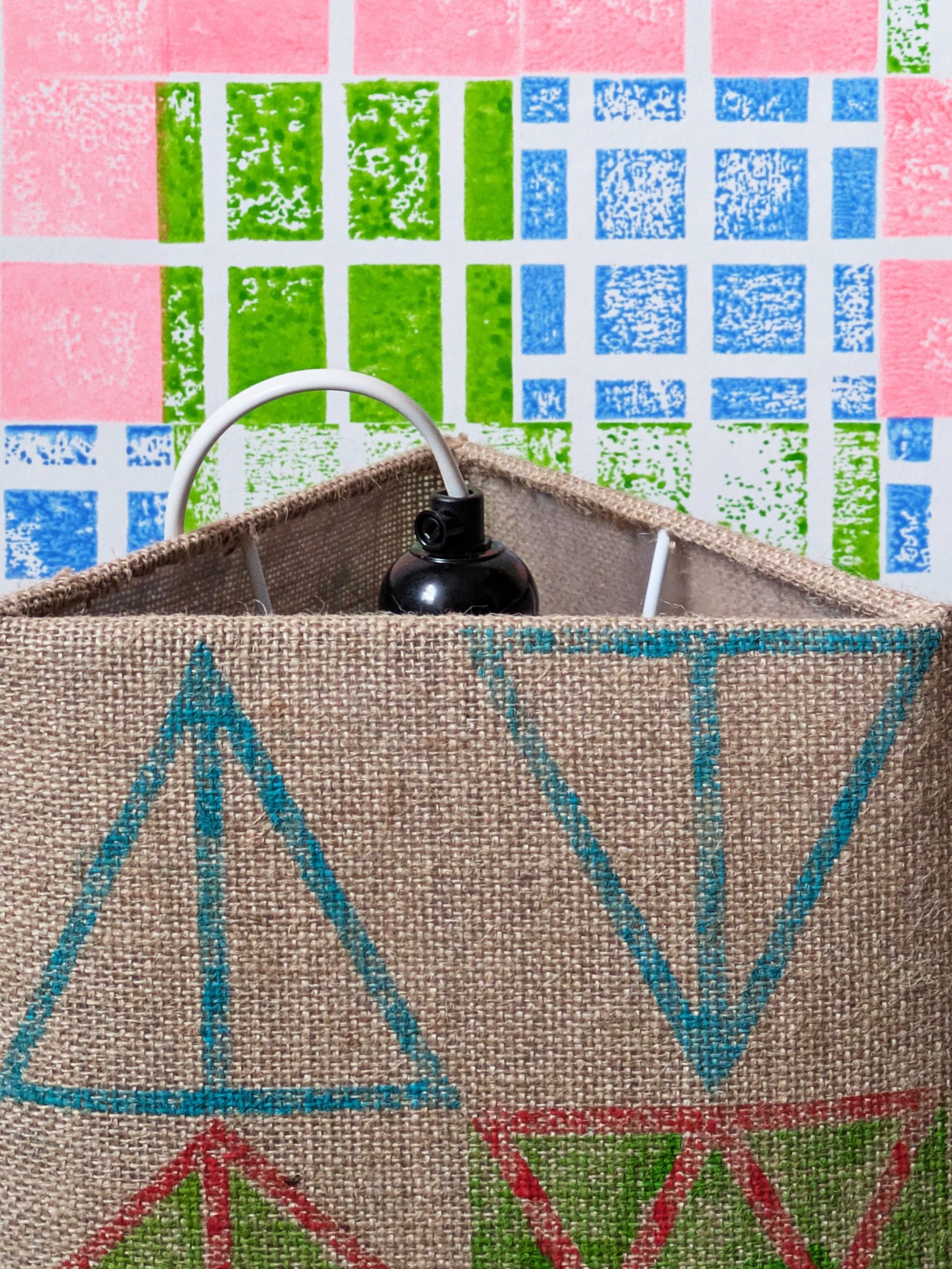 close-up details of block printed lampshade on natural jute with triangular frame and block print