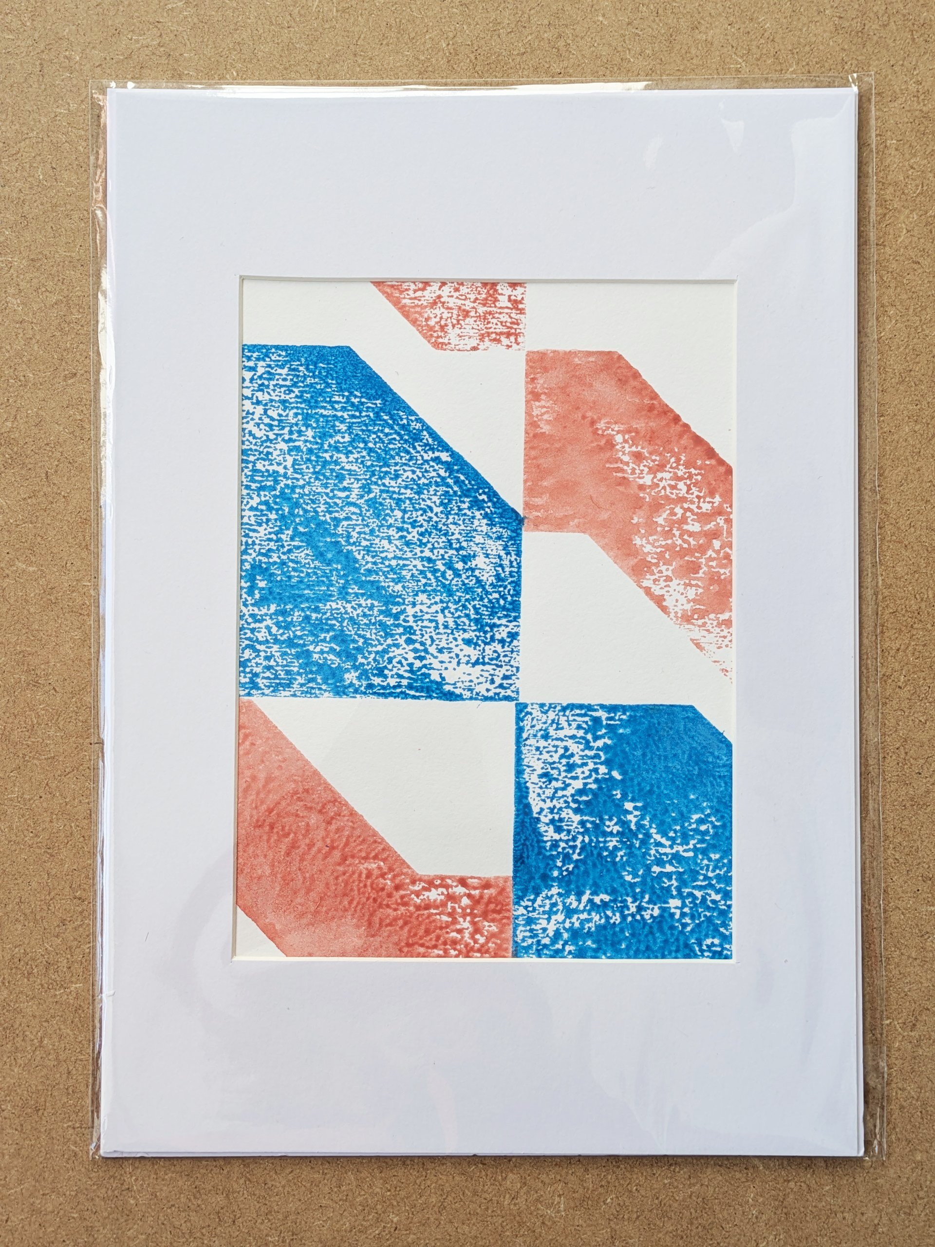 modern abstract geometric architectural print on wallpaper, framed in white mountboard in A3