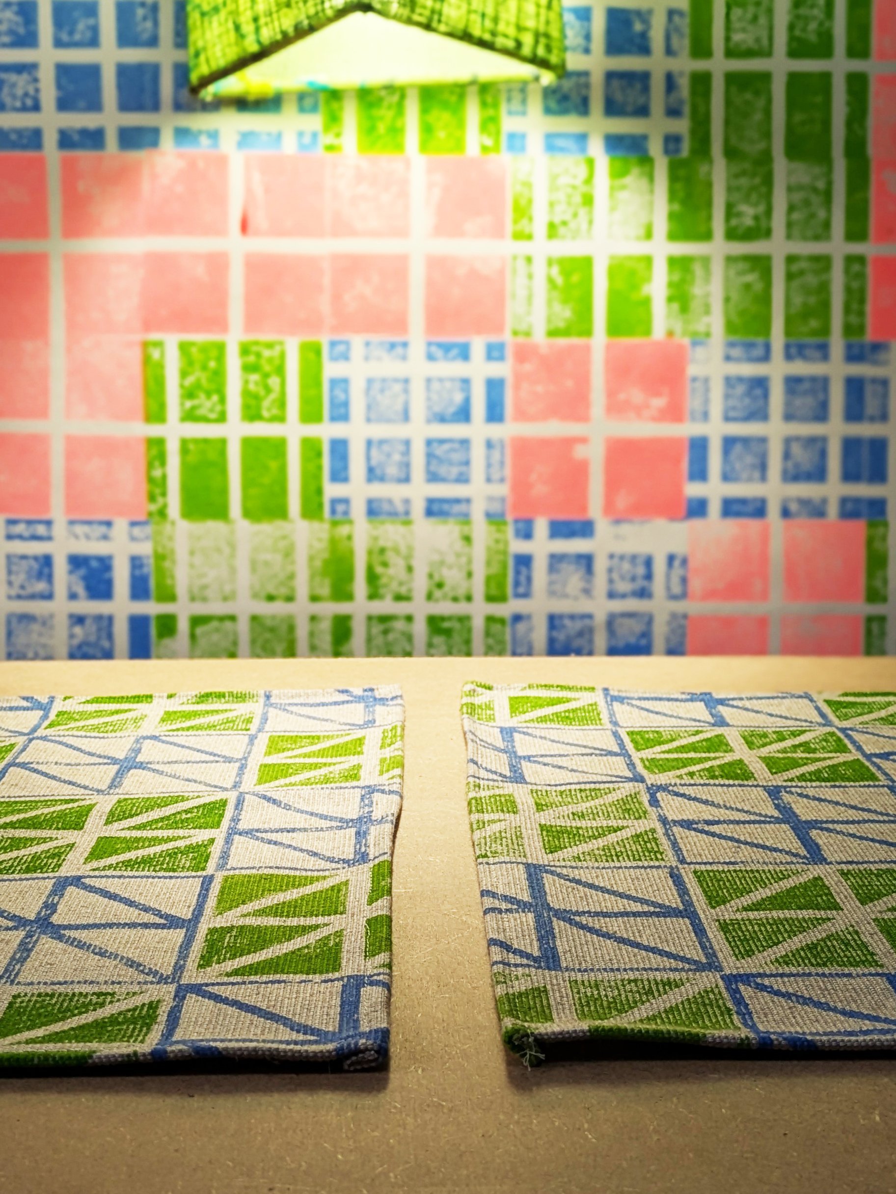 studio scene with triangular place mat on table