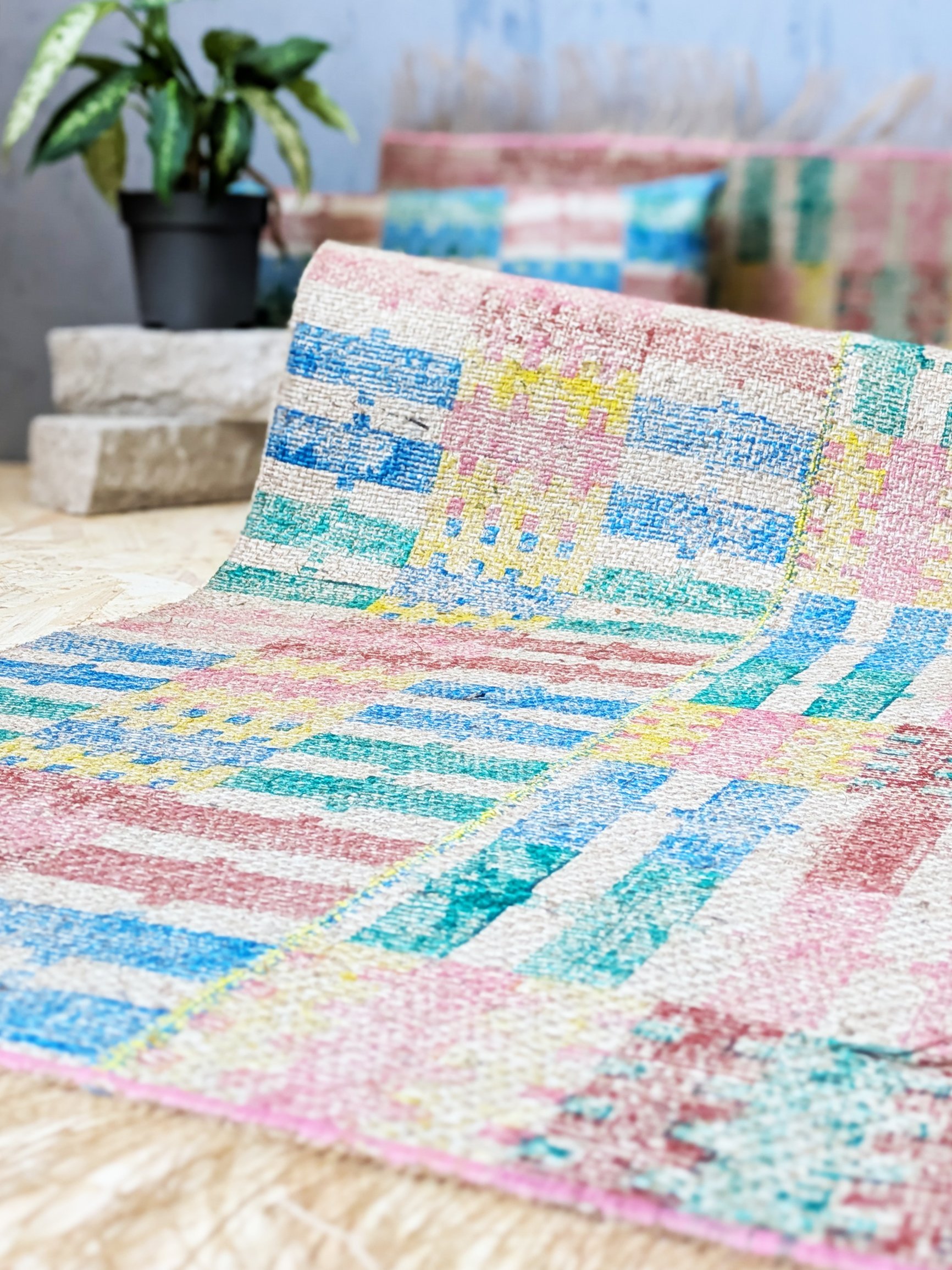 close-up details of bold colourful stripes on jute runner rug