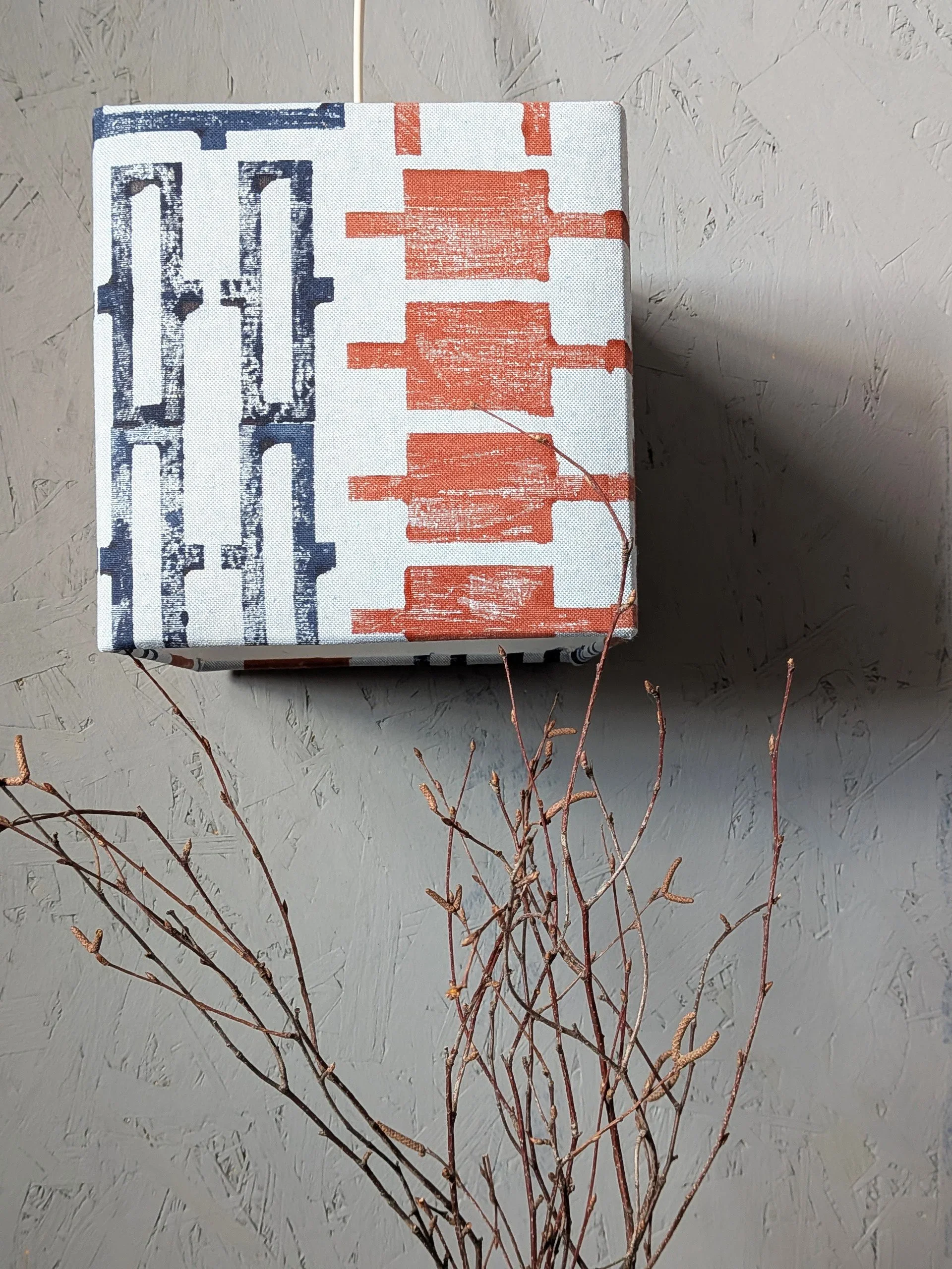 modern architectural inspired lampshade in blue and copper hand printed pattern