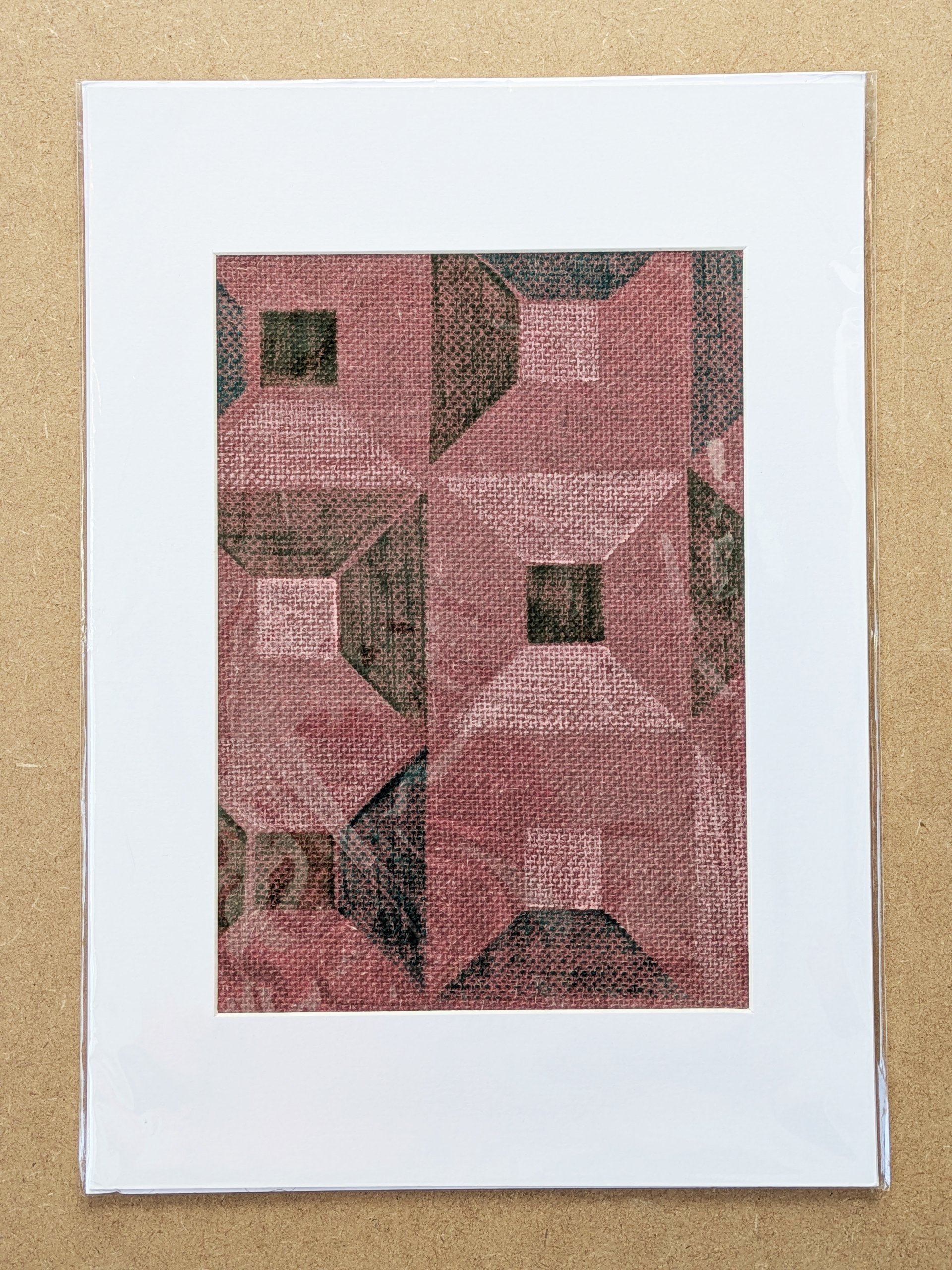 mounted A3 fabric art print with architecture inspired modern pattern in green colours hand block-printed on red grasscloth and framed in white mountboard