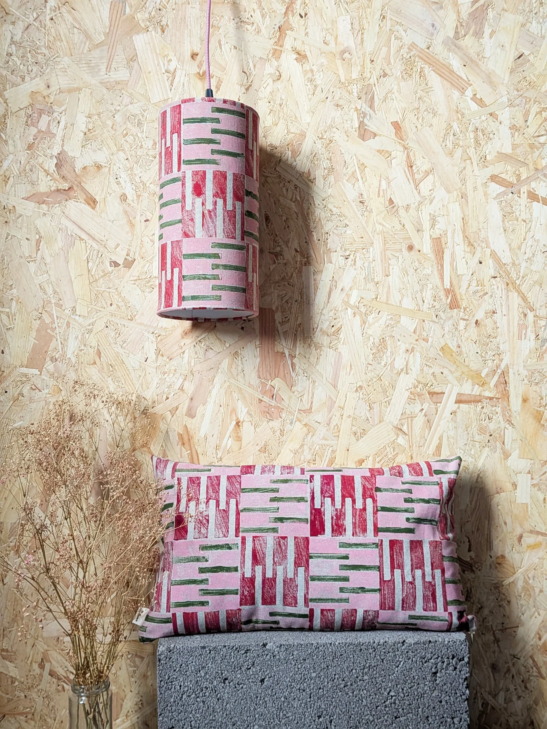 modern interior design scene with brutalism inspired hand block printed pattern on cushion and lampshade