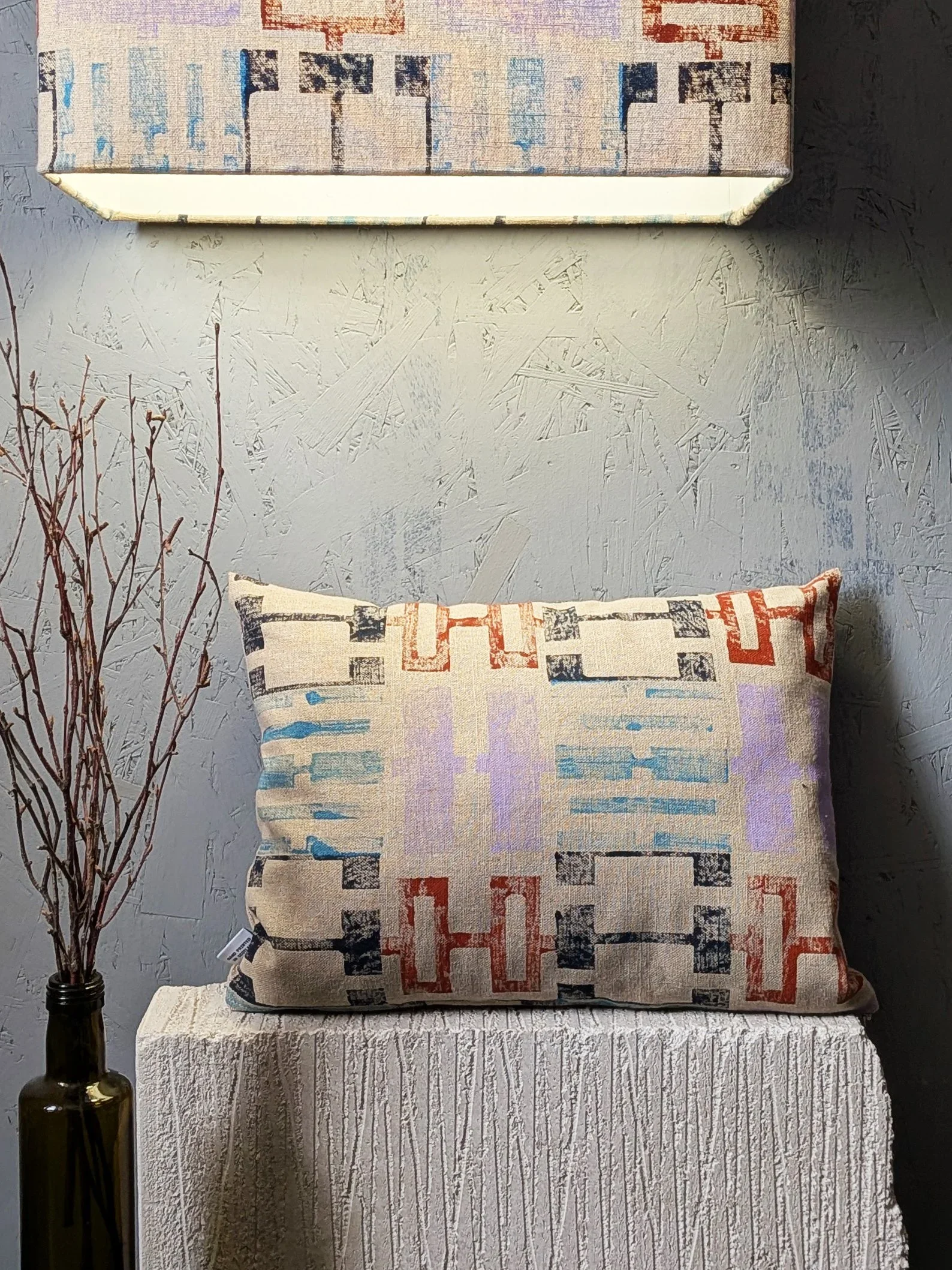 modern interior textile cushion with hand block printed architectural pattern on linen