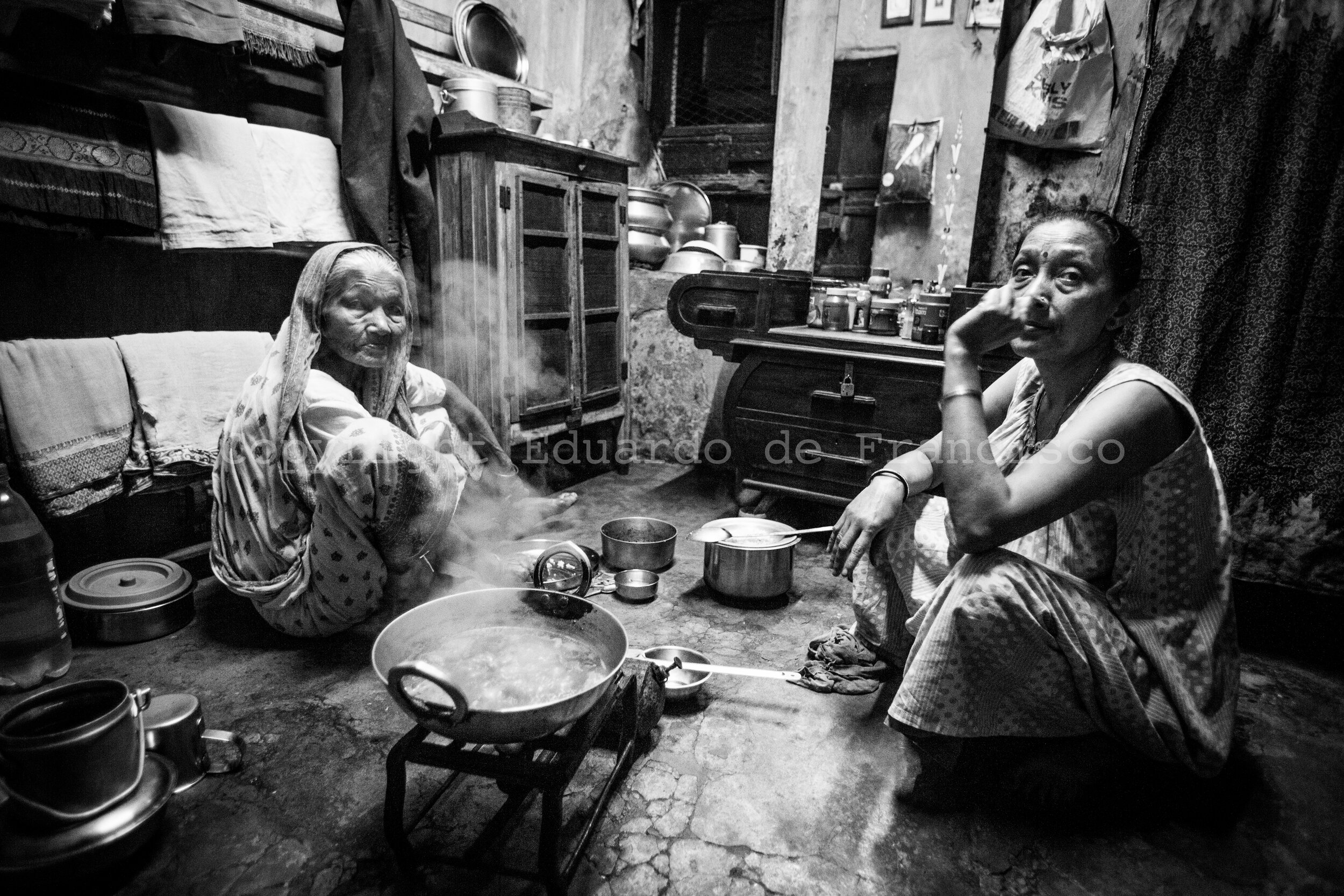  Tubhi Devi Thapa (on the left side), a Nepali woman who arrived to Sonagachi when she was 15. Her daughter, at the right side, works as a prostitute in the room shown in the picture and which also doubles as the home of both. 