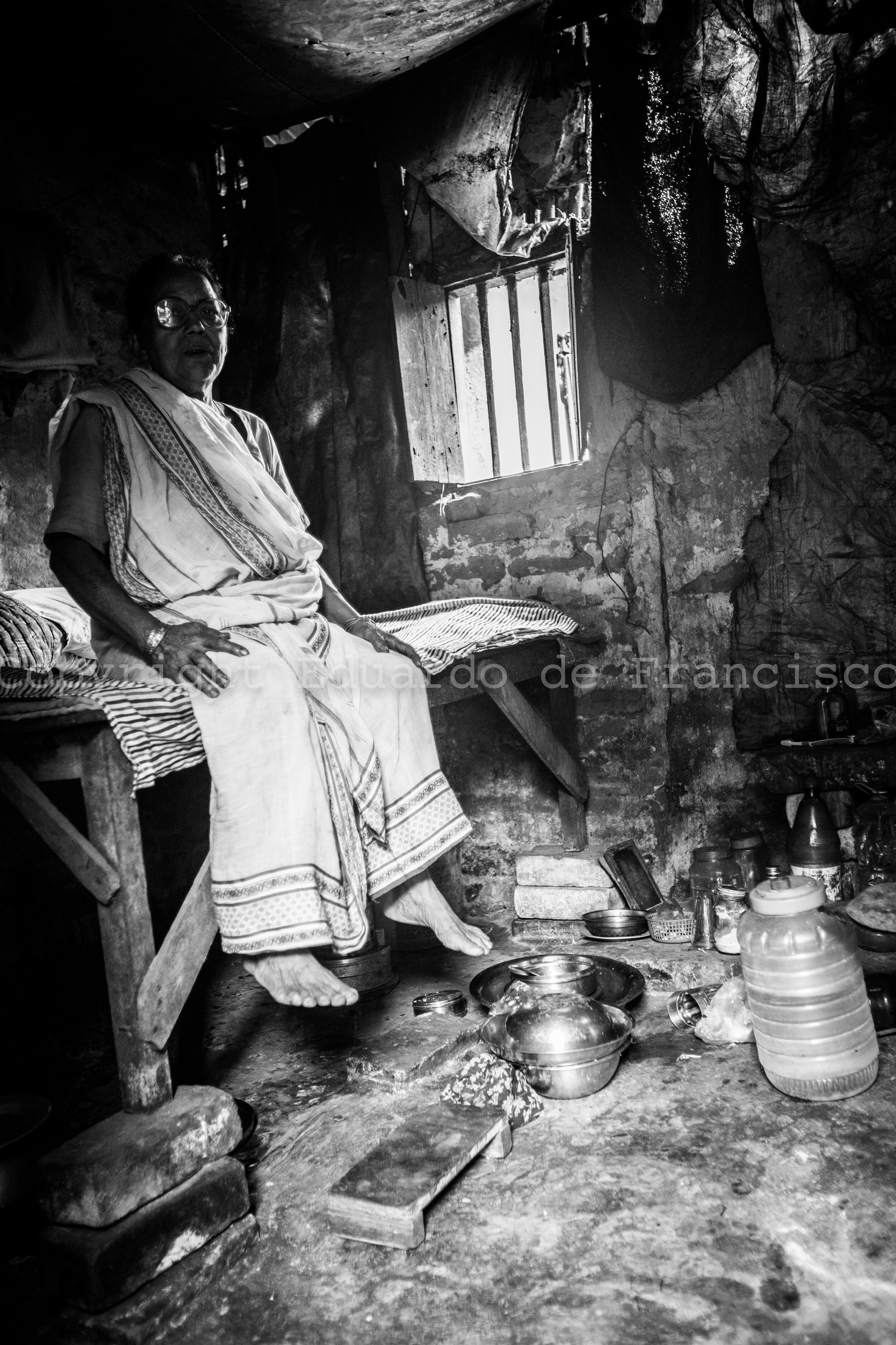  Shonali Devi at her room / house. More fortunate than other women, she is the owner of this room and can rent it to the younger girls. 