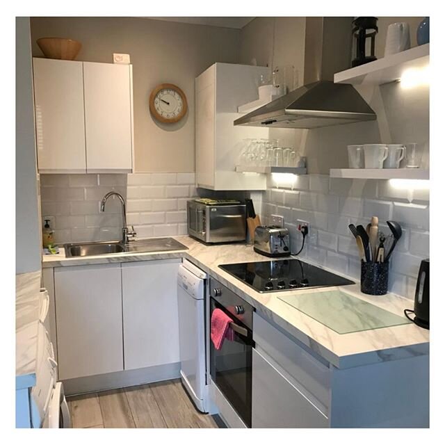 The kitchen area in one of our one bed flats in Central Winchester. These flats are perfect for a couple or if you have small kids there is also a comfortable sofa bed in the living area. There are fields at the end of the road for getting a breath o