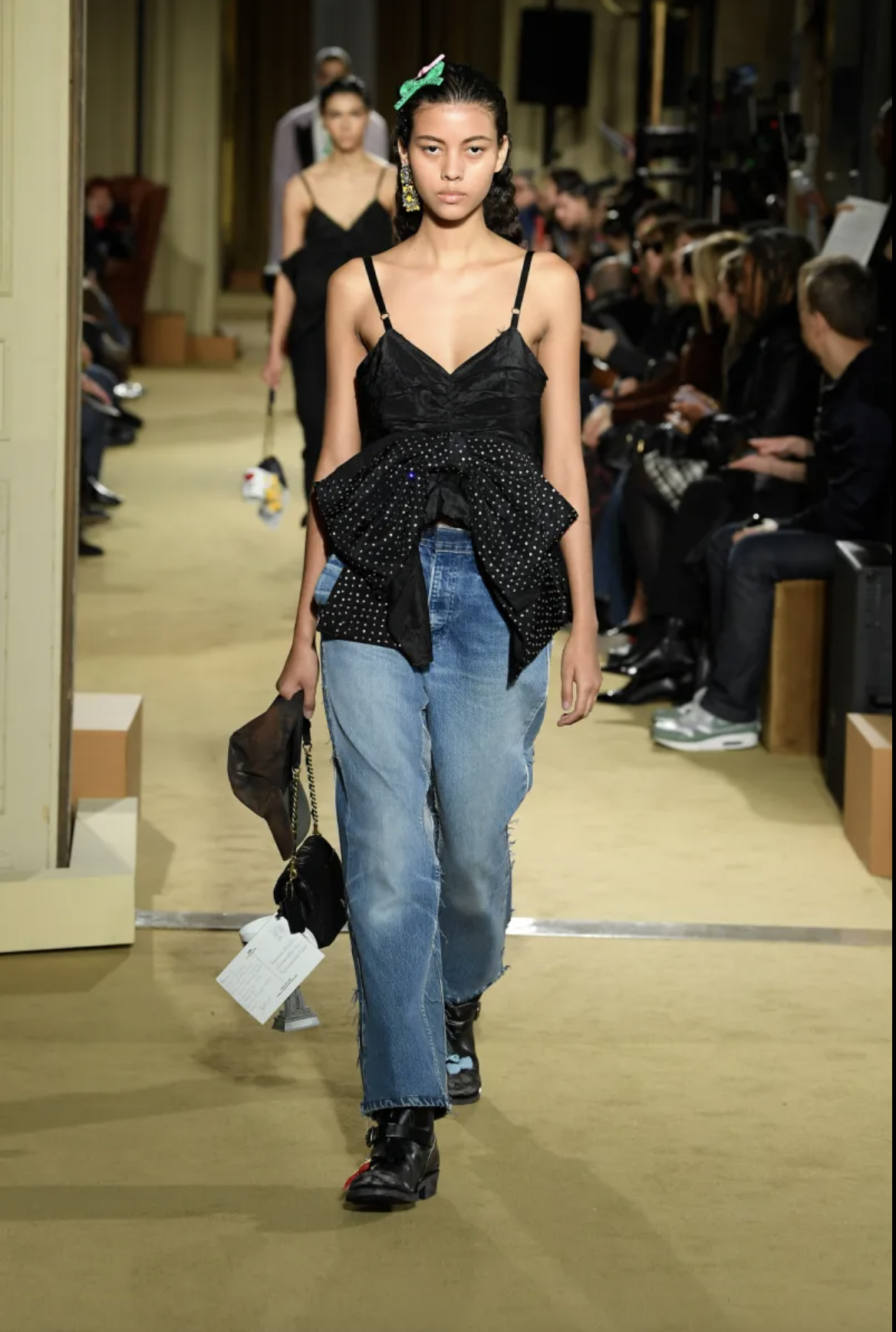 Fall 24 silk top with bow made from repurposed materials and upcycled jeans made from vintage Levi's