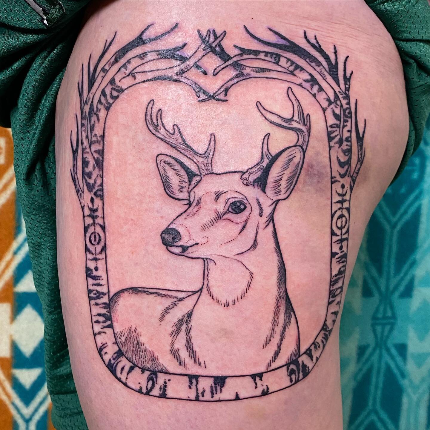 A buck in honor of Buck, framed by the Stockbridge-Munsee Many Trails sign growing in birch, on the incredible @waksik (who is so tough for getting tattooed over a huge roller derby bruise!)
