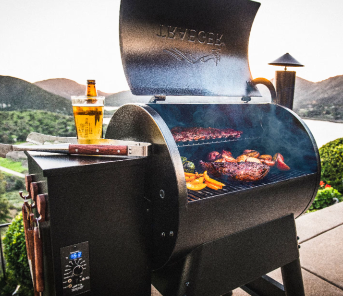 BBQ LOVERS’ DREAM: TRAEGER WITH CUT/WRAPPED HOG AND CUT/WRAPPED LAMB: Take your backyard cooking to the next level with the Traeger Pro Series 34 donated by McKinnon Lumber. Featuring an impressive 884 square inches of cooking space, this versatile w
