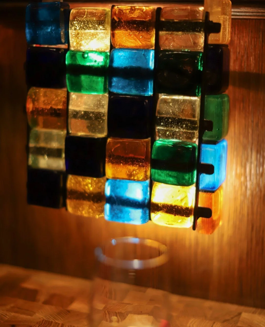 NYC restaurant El Quijote showing historic ceiling, booth seating, four tops, and vintage french chandelier pendant lights. Hospitality interior design and consultancy by Studio Sio, New Zealand