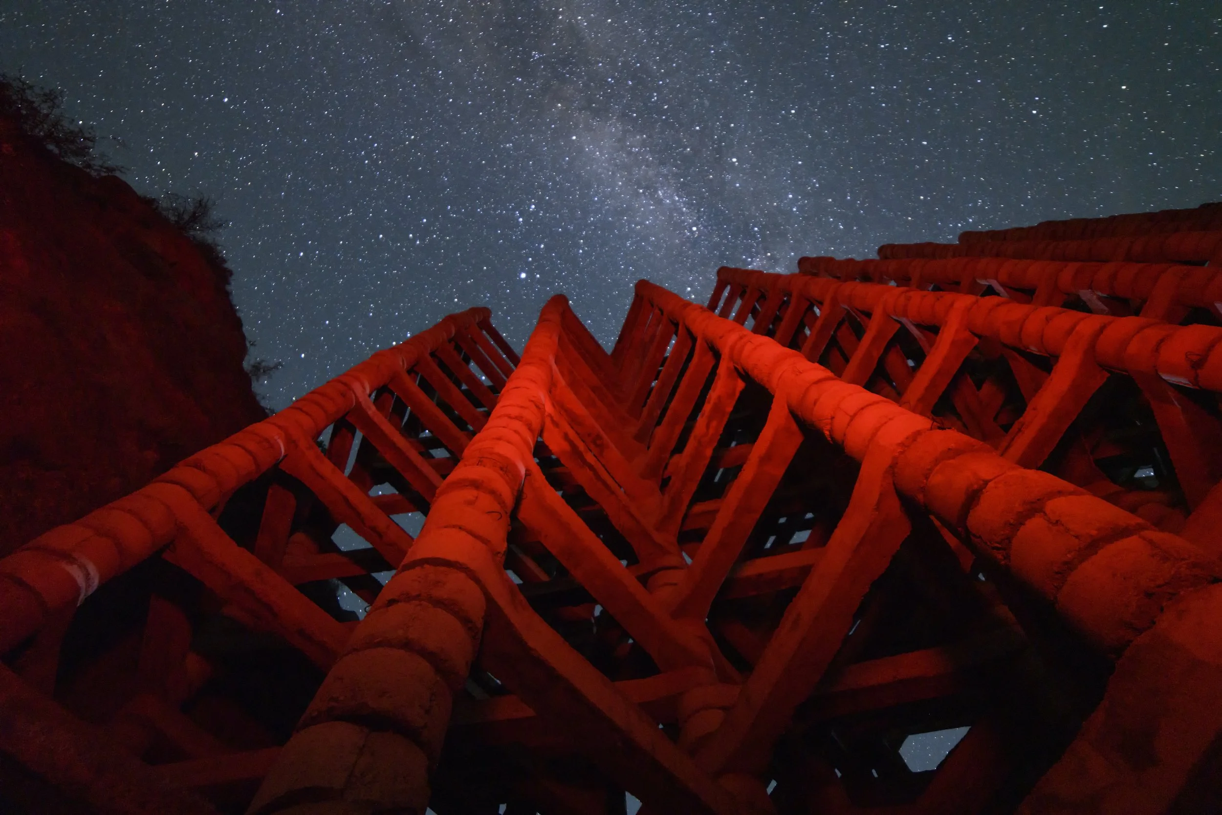 “Red Ladder at Night” by Mary Dean Lee