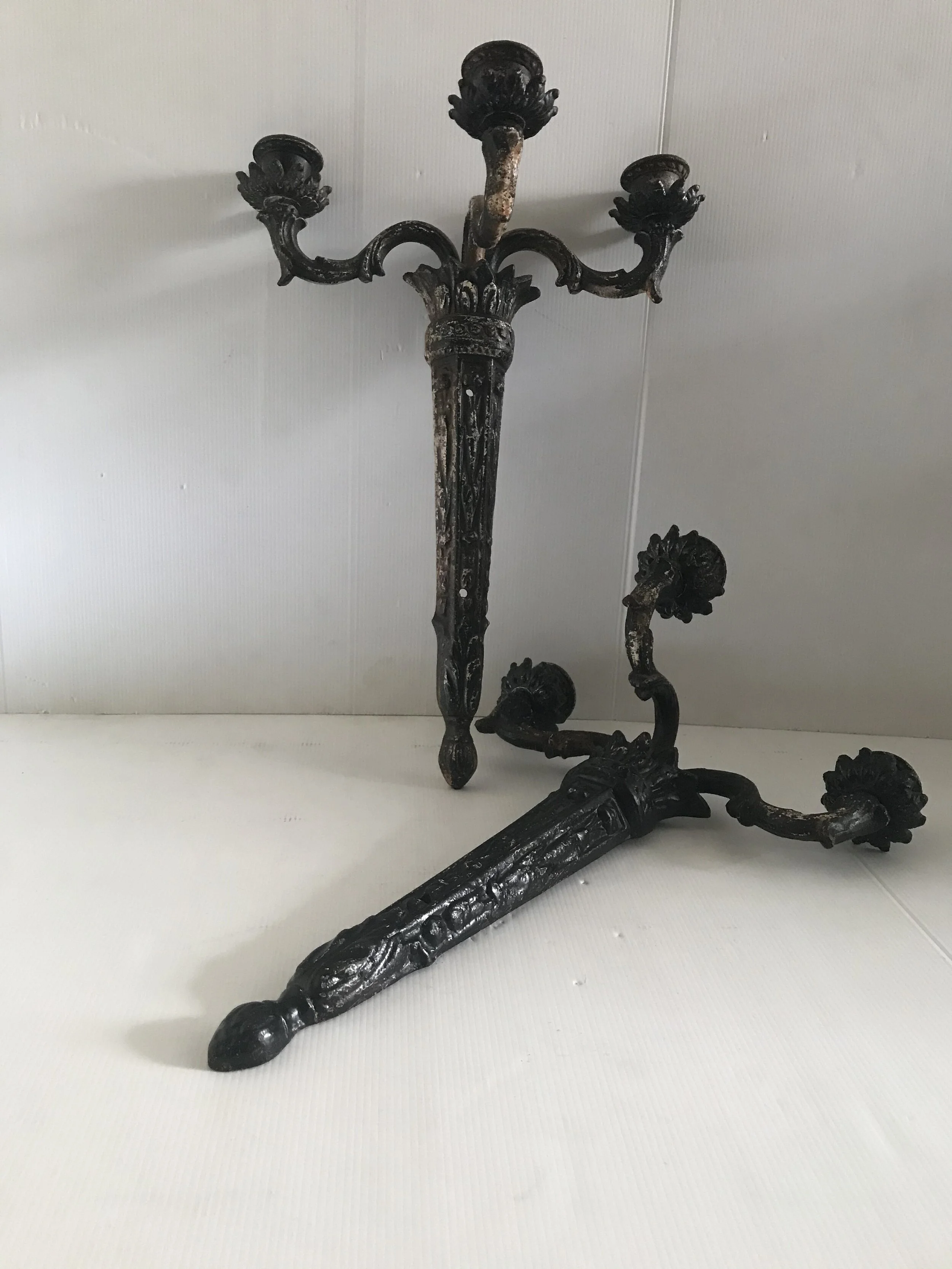 SOLD -  A Pair of Antique Cast Iron Wall Candle Sconces