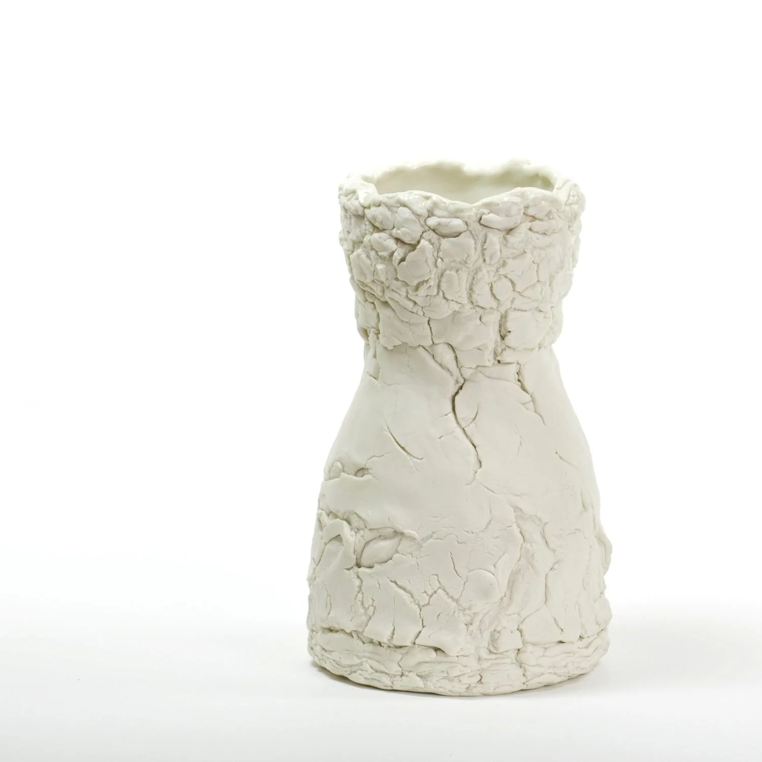 Transparent Vase (#25.8.9), 2025, hand-built, pinched porcelain, textured, unglazed interior with transparent glaze interior, 7 x 4.25 inches (17.7 x 10.3 cm), $250 Cdn.