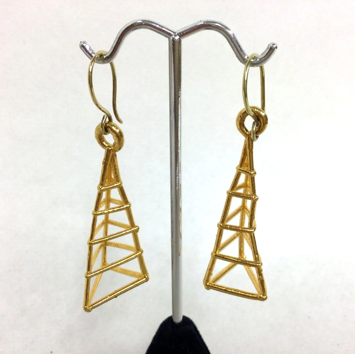 Point Scaffold Cage Earring (#270), 2018, thick electroformed 24k gold, 18k gold ear wire, fusion welded stainless steel, electroformed copper, 2.5 x .75 inches (6.5 x 2  cm), $940 Cdn.