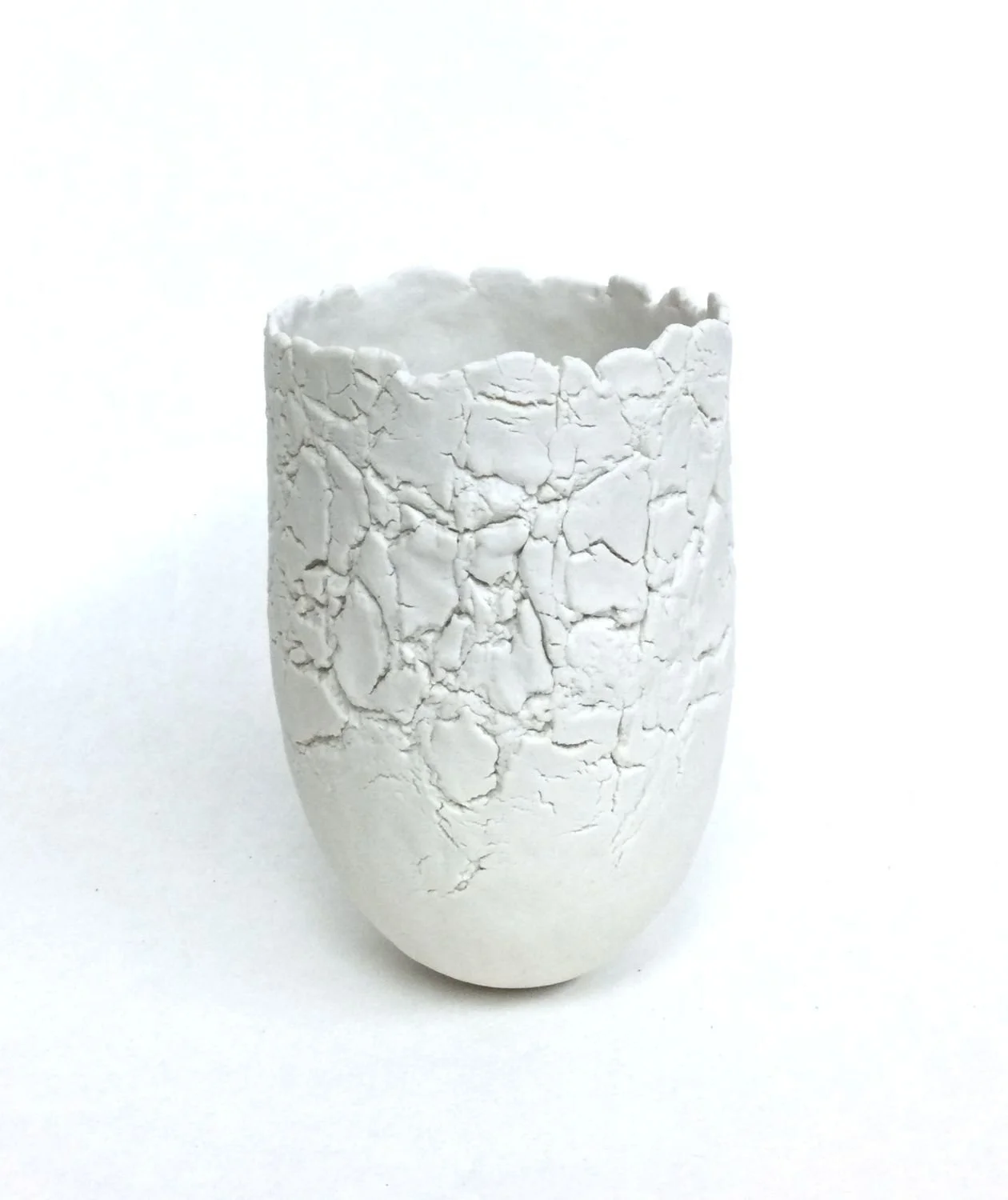 Rising Vessel (#25.8.10), 2025, pinched porcelain, textured surface, unglazed, 6 x 4 inches (15.3 x 10.2 cm), $250 Cdn.