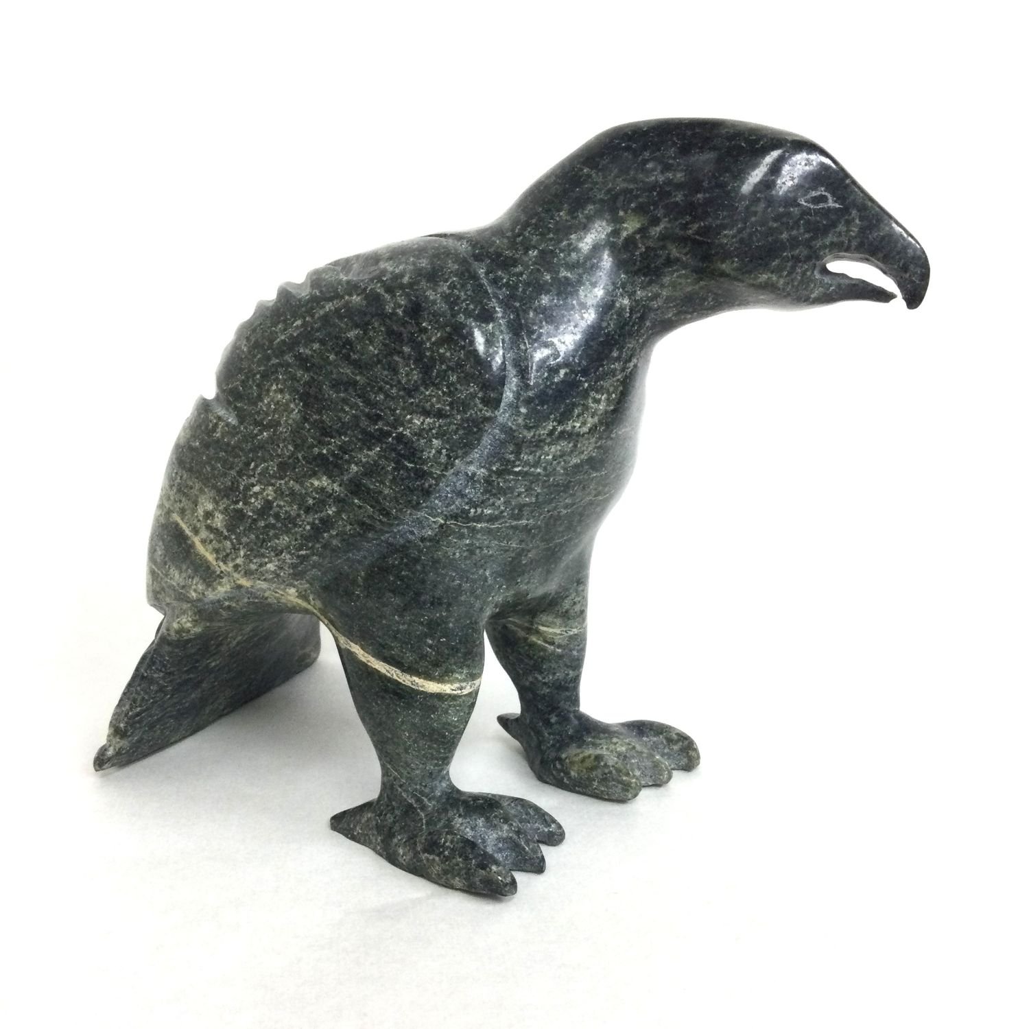 unknown artist, Qamani’tuaq/Baker Lake ᖃᒪᓂᑦᑐᐊᖅ , Arctic Bird, c. 1970s, serpentine, 7 x 5 x 9.25 inches (18 x 12.5 x 23.5 cm), $1500 Cdn.