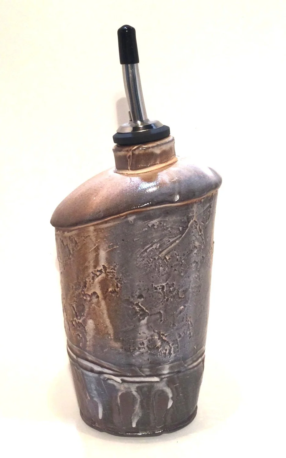 Confluence - Oil Bottle (#26-2-31), 2026, low soda fired earthenware, 8.75 x 3 x 4 inches (22.5 x 8 x 10 cm), $110 Cdn.