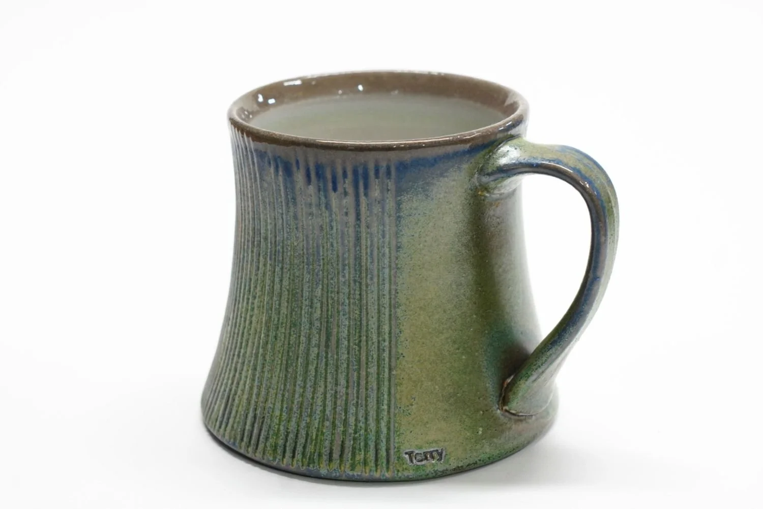 Bell-Bottom Mug (#25.49), 2025, soda fired porcelain, 3.5 x 3 x 4.25" (9 x 7.5 x 11 cm) $50 Cdn