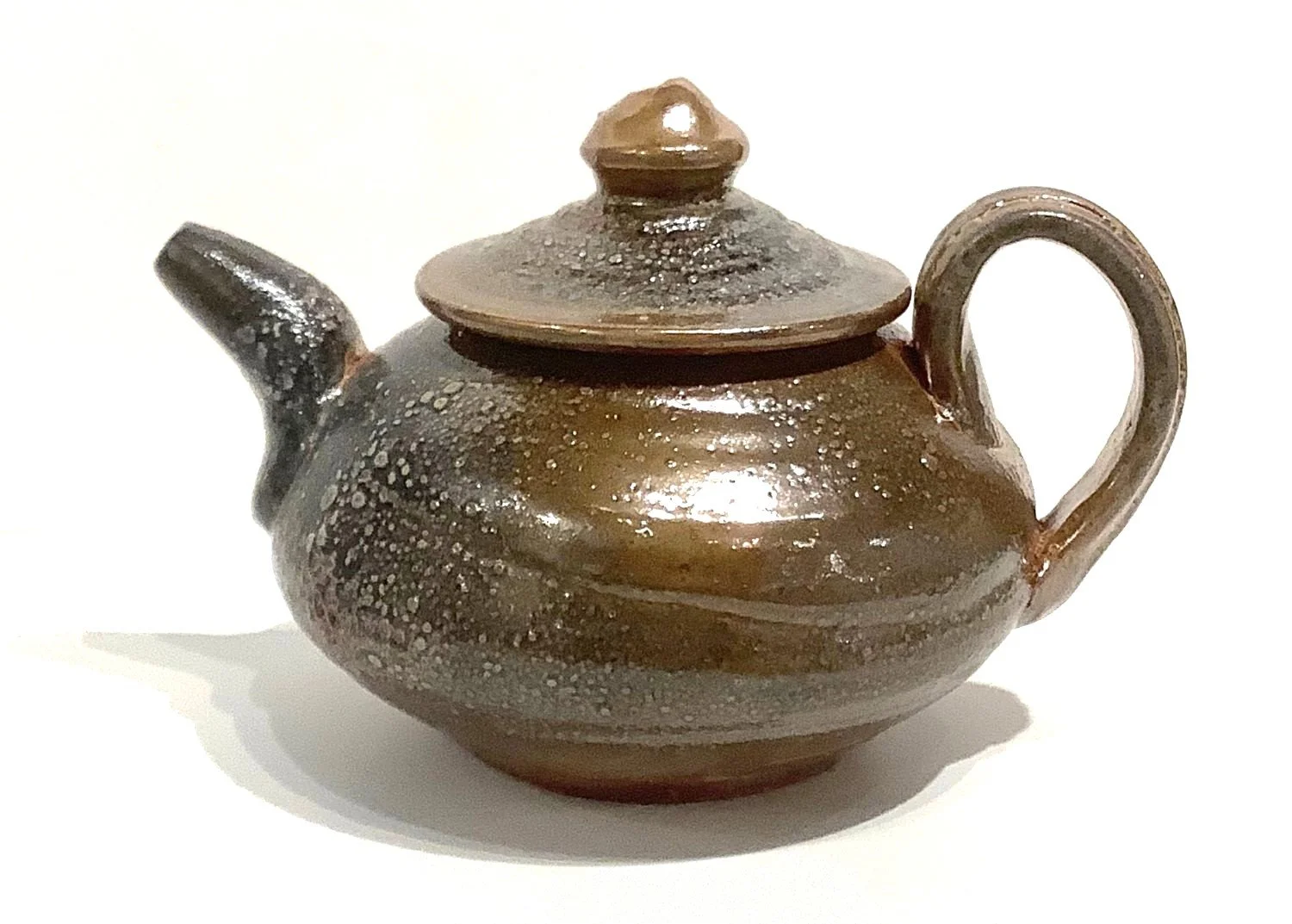 Soda Fired Teapot (#24.11.60), 2024, porcelain, 5.5 x 8.25 x 6.25 inches (14 x 20.6 x 15.9 cm), $110 Cdn.