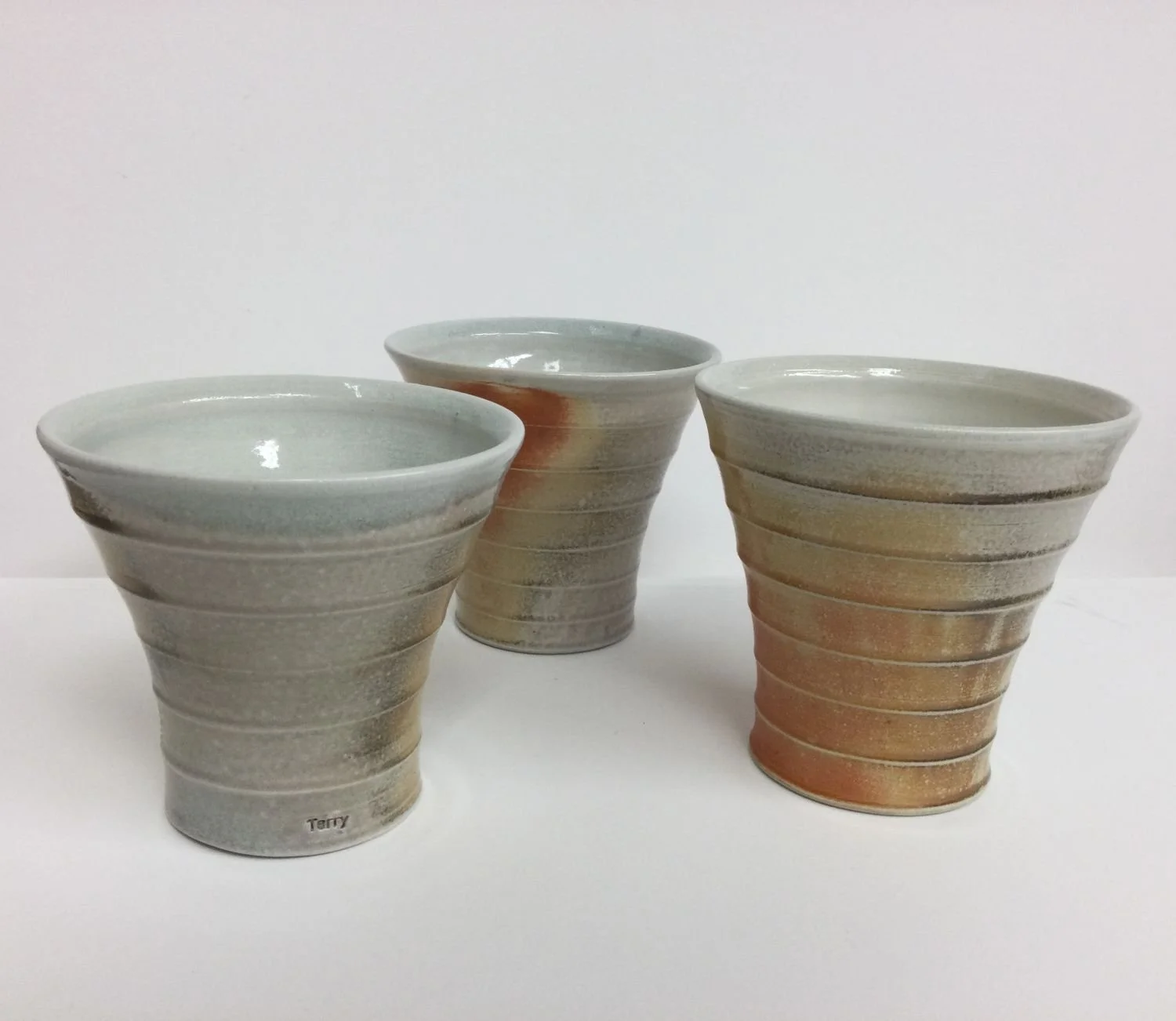 Porcelain Glasses (#25.7.3dbc), 2026, soda fired porcelain, 4 x 4.25 inches (10 x 10.5 cm), $45 Cdn each