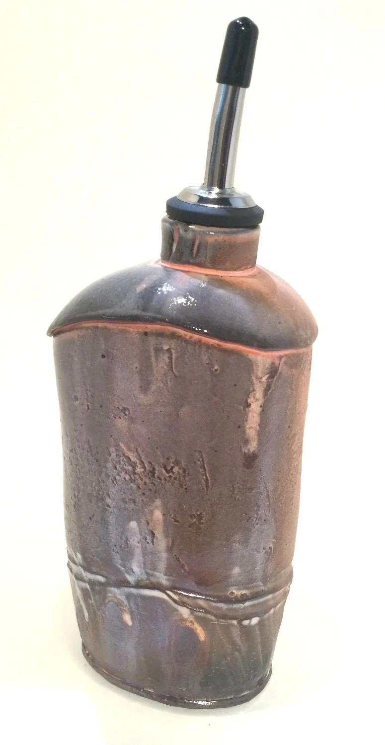 Confluence - Oil Bottle (#26-2-33), 2026, low soda fired earthenware, 8.75 x 3 x 4 inches (22.5 x 8 x 10 cm), $110 Cdn.
