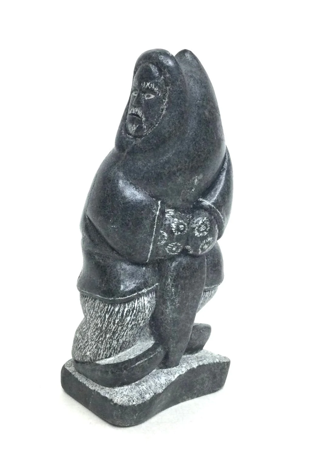 Lucassie Echalook E9-1582, ᓗᑲᓯ ᐃᑲᓗ (1904-) Inukjuak/Port Harrison, ᐃᓄᒃᔪᐊᒃ, Hunter With Seal (#26.1.13), c. 1950s, serpentine, 6 x 2.25 x 2.75 inches (15 x 6 x 7 cm), provenance: private collection Saskatchewan, $650 Cdn.