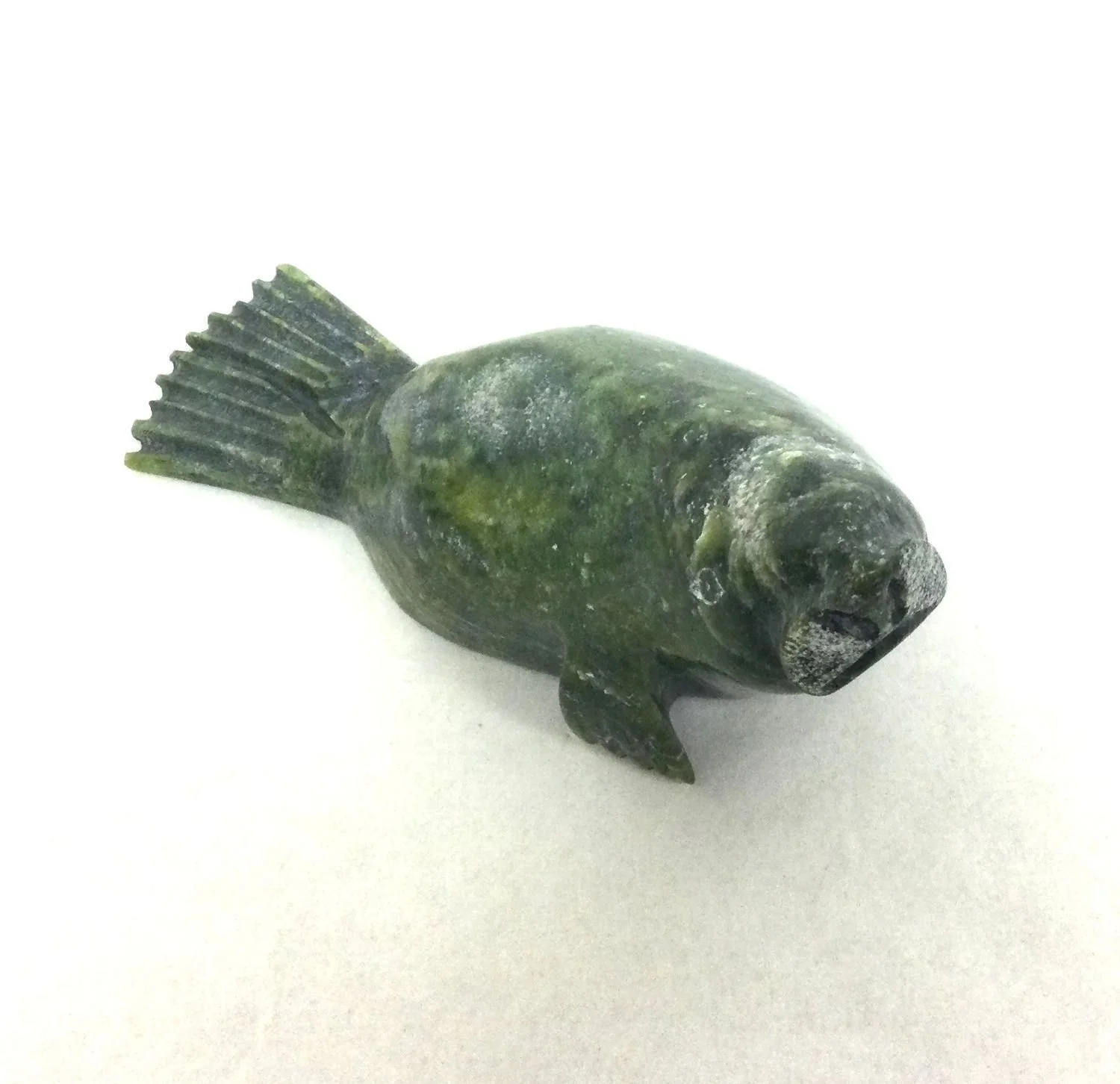 Lyta Josephie E7-2201 (1964-) Kimmirut / Lake Harbour ᑭᒻᒥᕈᑦ, Resting Walrus (#26.1.6), 2018, serpentine, 2.5 x 5.25 x 2.5 inches (6x13.5x6.5 cm), provenance: private collection Saskatchewan, $475 Cdn.