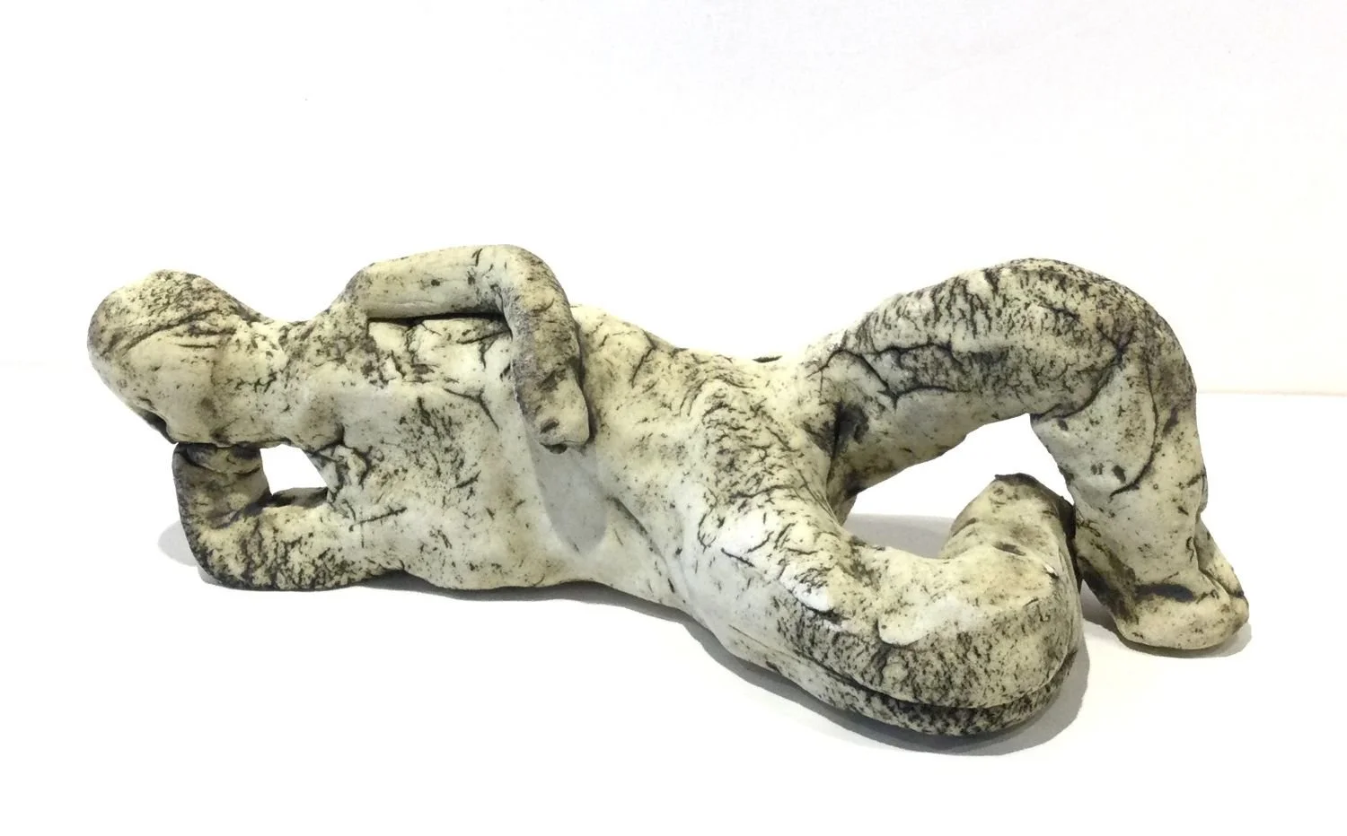 The Dreamers #32-4, 2025, stoneware, 3 x 9 x 4 inches (8 x 23 x 10 cm), $325 Cdn.