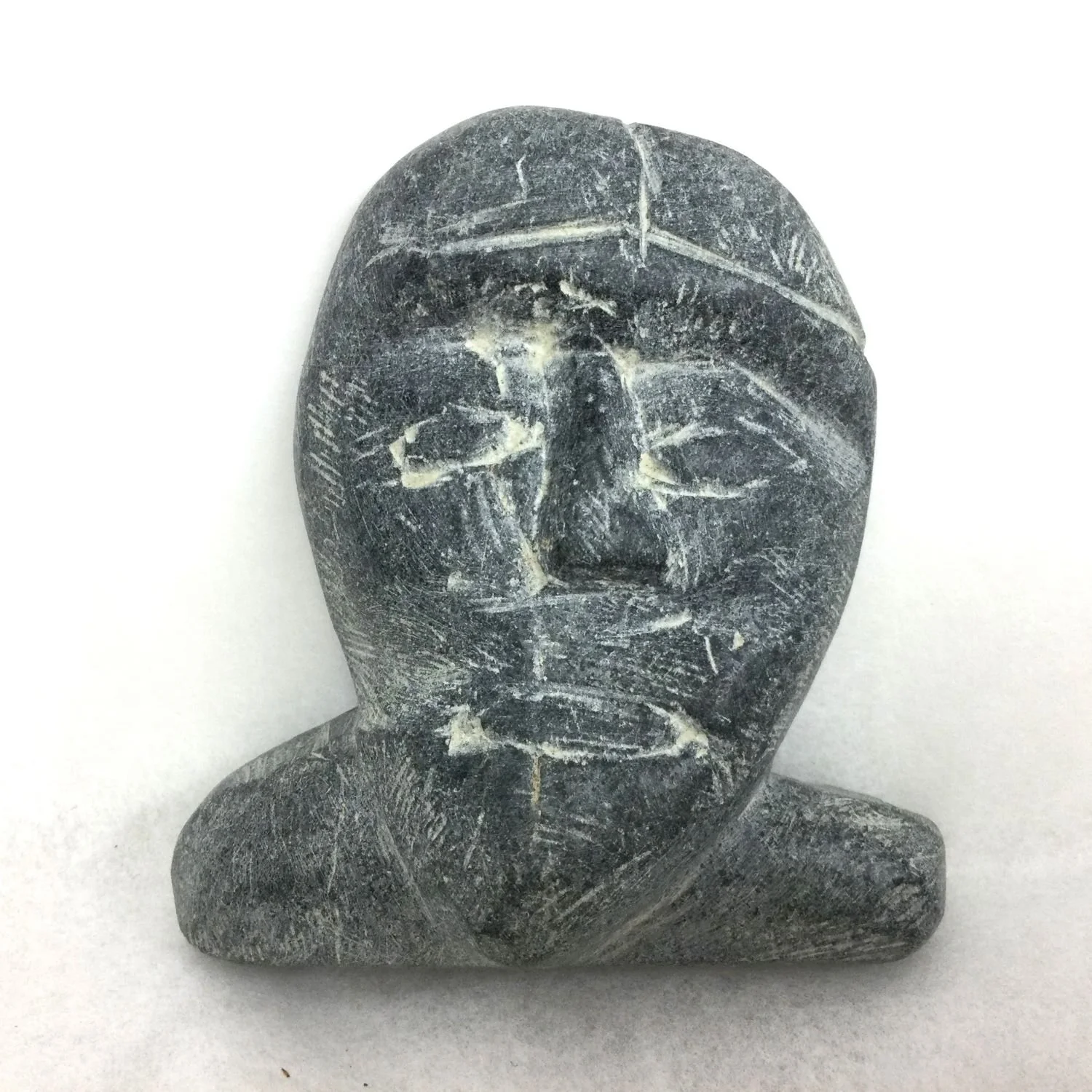 Eli Tikeayak E2-166 (1933-95) Kangiqliniq/Rankin Inlet ᑲᖏᕿᓂᖅ, Small Bust, n.d., steatite/serpentine, 3 x 2.75 x 1 inches (7.5 x 7 x 2.5 cm), provenance: private collection BC, $250 Cdn.