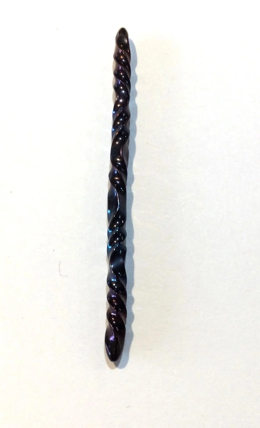 Quantum Wave Tie Pin (#0127D), 2025, steel, magnetic device, 3 x 0.15 x 0.15''/7.7 x 0.5 x 0.5cm (Including magnet: 3x0.5x0.25'' 7.7x1.5x1cm) (just magnet: 1.75x0.5'' 4.5x1.5cm), $200 Cdn....Note: The pin is secured by a magnet concealed behind the f