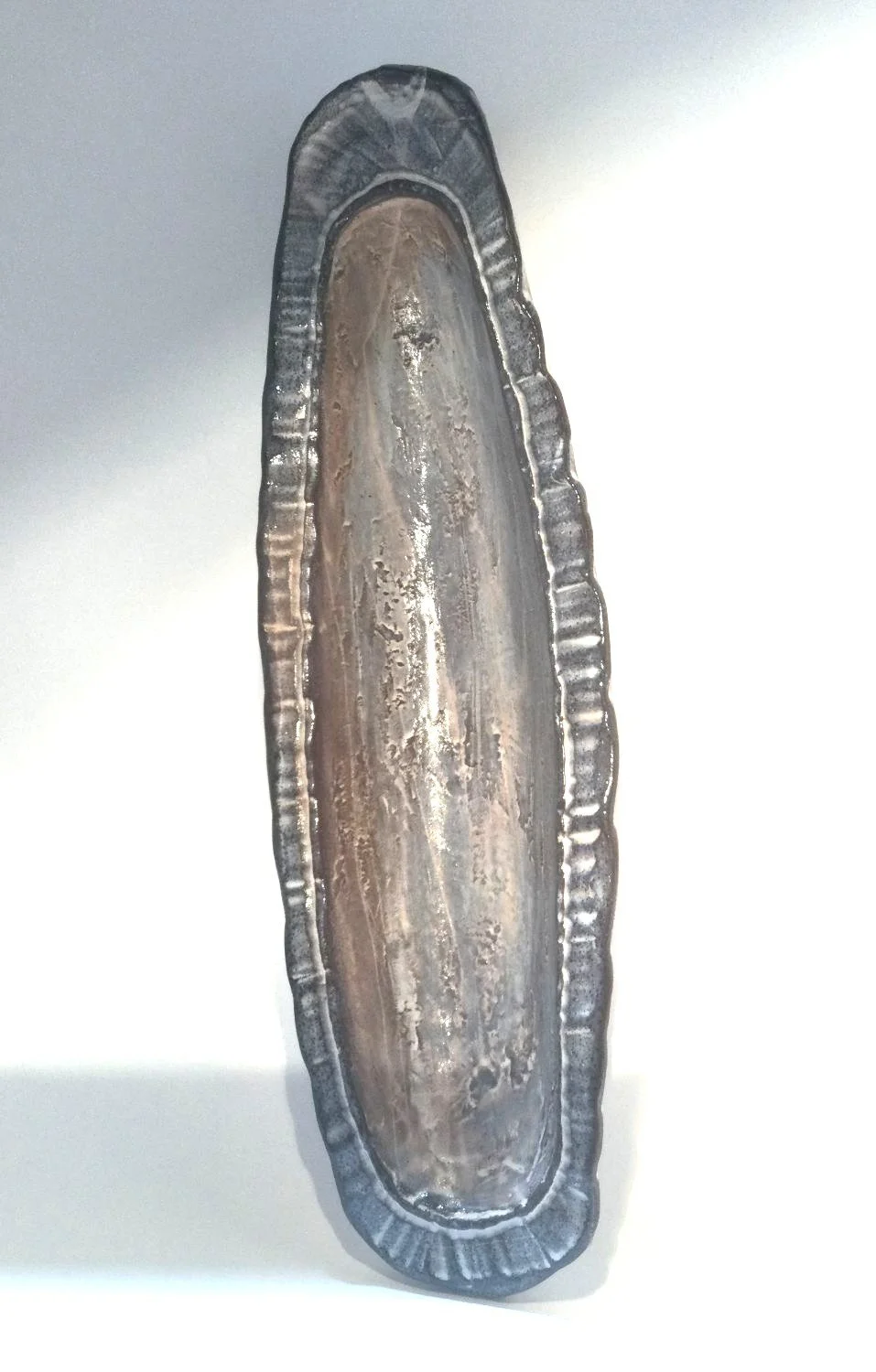 Large Confluence Tray (#26.2.16), 2026, low soda fired earthenware, 2 x 4.5 x 14.5 inches (5 x 11 x 37 cm), $180 Cdn.