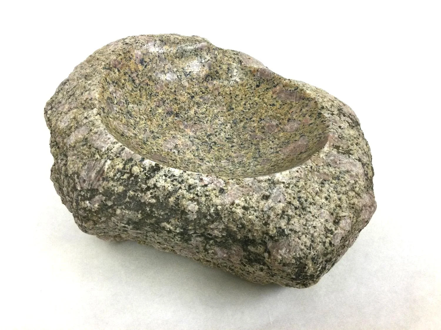 Fieldstone Bowl (#25.35), 2025, found rock, bored, polished, 4.25 x 11.5 x 10 inches (12 x 29 x 25.5 cm) $495 Cdn