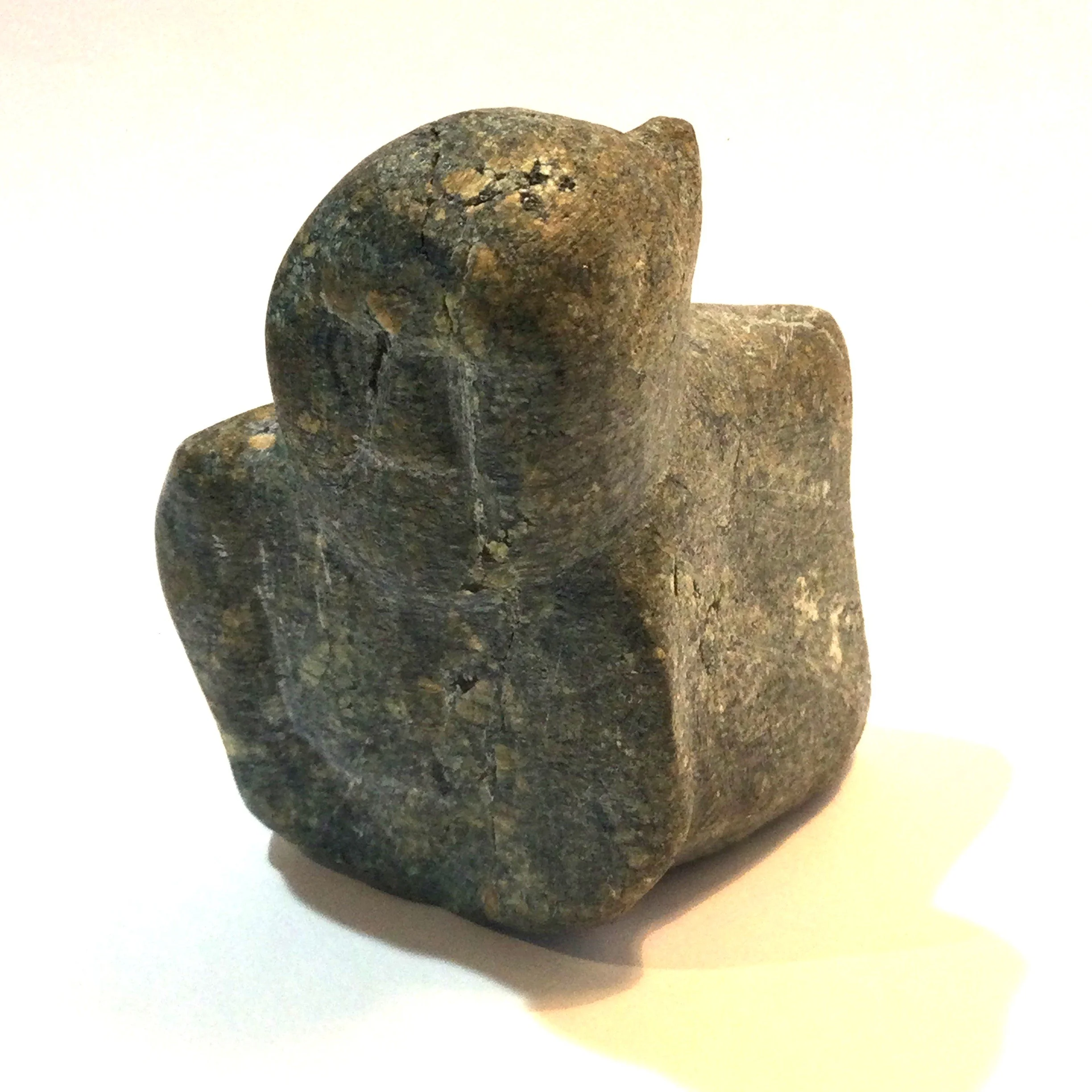 Mary Kahootsuak Miki E1-437 (1920-93), Arviat/Eskimo Point ᐊᕐᕕᐊᑦ, Woman, c. late 70s, basalt/serpentine, 2.75 x 2.25 x 1.25 inches (7 x 6 x 3 cm), $325 Cdn.