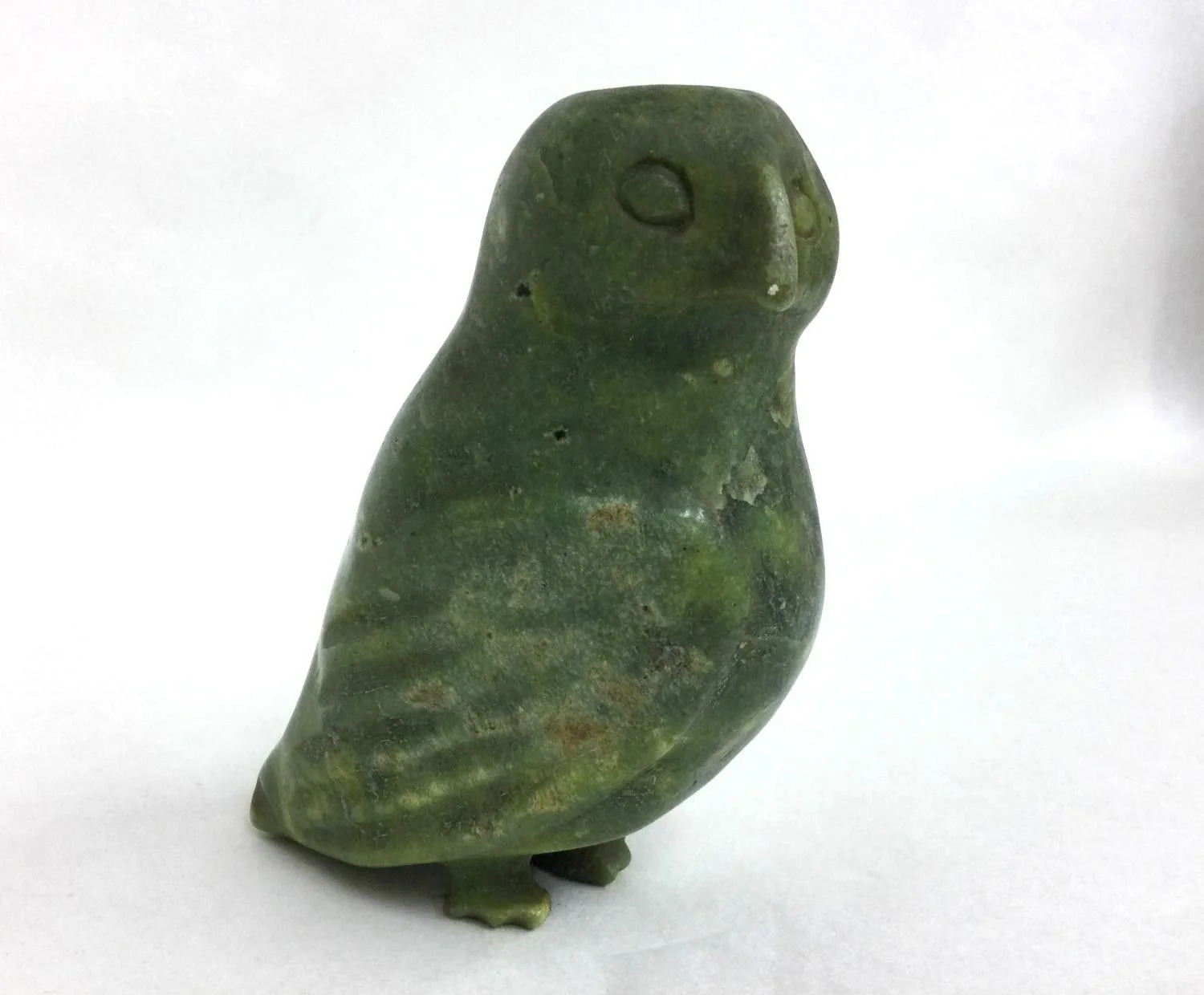 Osuitok Ipeelee RCA, E7-115, ᐅᓱᐃᑐ ᐃᐱᓕ (1923-2005) Kinngait/Cape Dorset, ᑭᙵᐃᑦ, Owl (#25.9.12, unsigned), c. 1957, green serpentine, 5.5 x 4 x 2.5 inches (14 x 10 x 6.25 cm), provenance: private collection BC, $2100 Cdn.