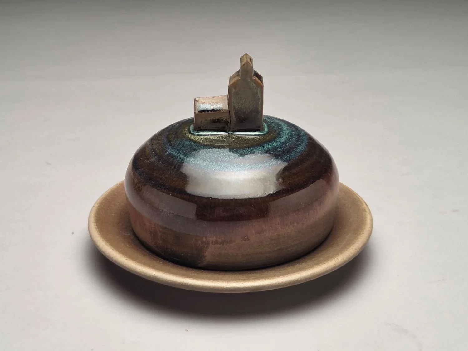 Blue Skies & Grain Elevator Butter Dish (#26.5.4d), 2026, glazed stoneware, 4.25 x 5.75 x 5.75 inches (11 x 14.5 x 14.5 cm), sold.