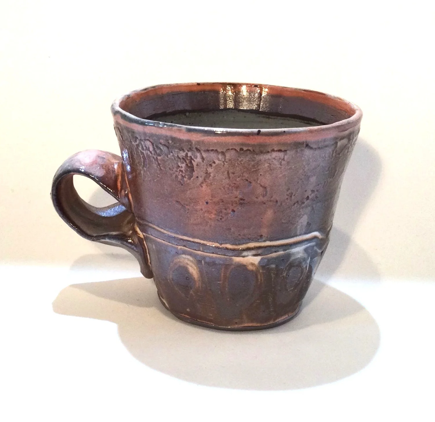 Confluence - Espresso Mug (#26.2.76), 2026, low soda-fired earthenware, 3.25 x 4.25 x 3.25 inches (8.5 x 11 x 8 cm), $60 Cdn.